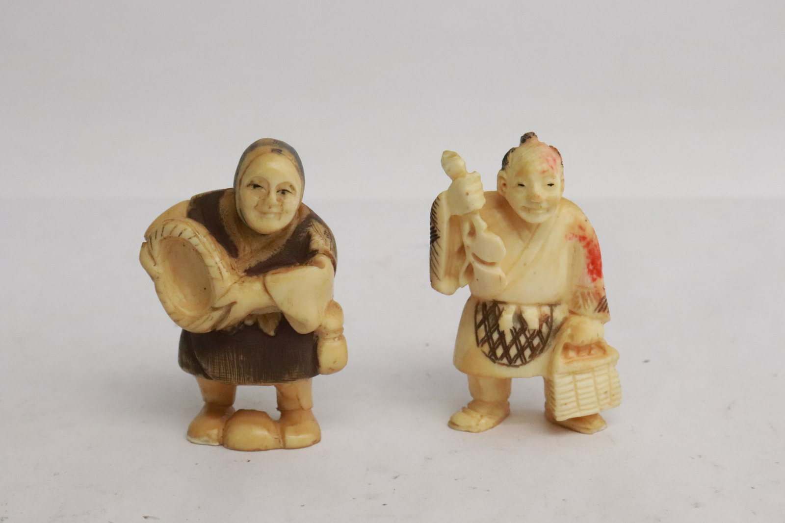 2 Japanese bone carved netsukes: 2 Japanese bone carved netsukes, 2"H, 2.1"H