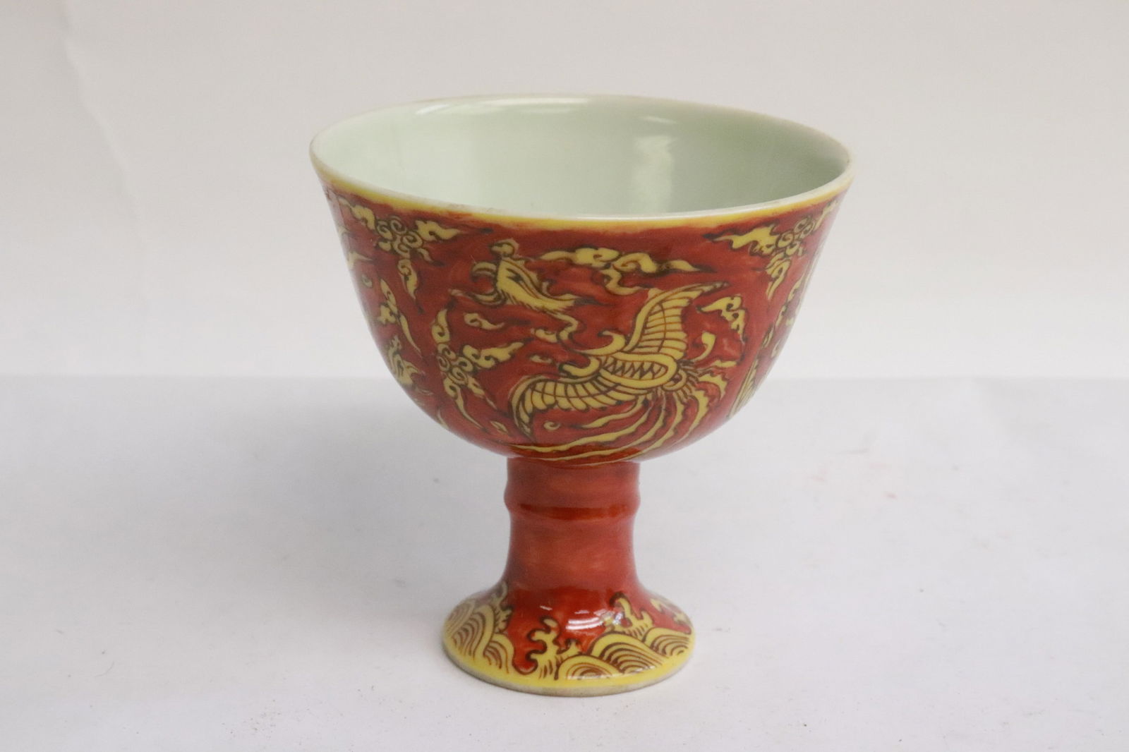 A yellow on red stem tea cup: A yellow on red stem tea cup, 3"x3.1"dia