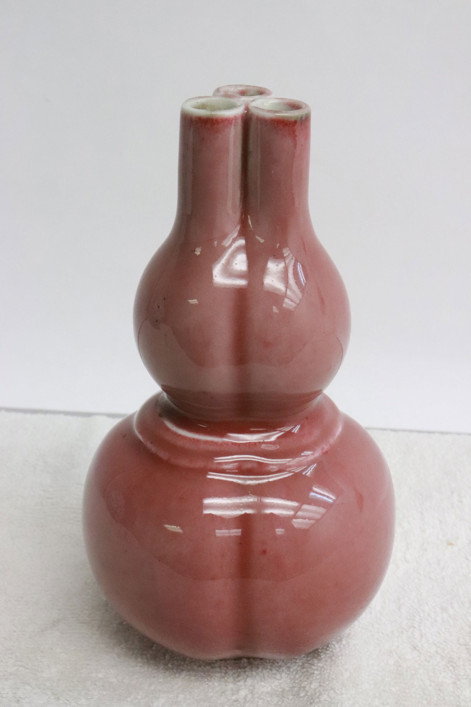 Chinese red glazed porcelain 3-hole vase: Chinese red glazed porcelain 3-hole vase, 6.25"x3.5"dia