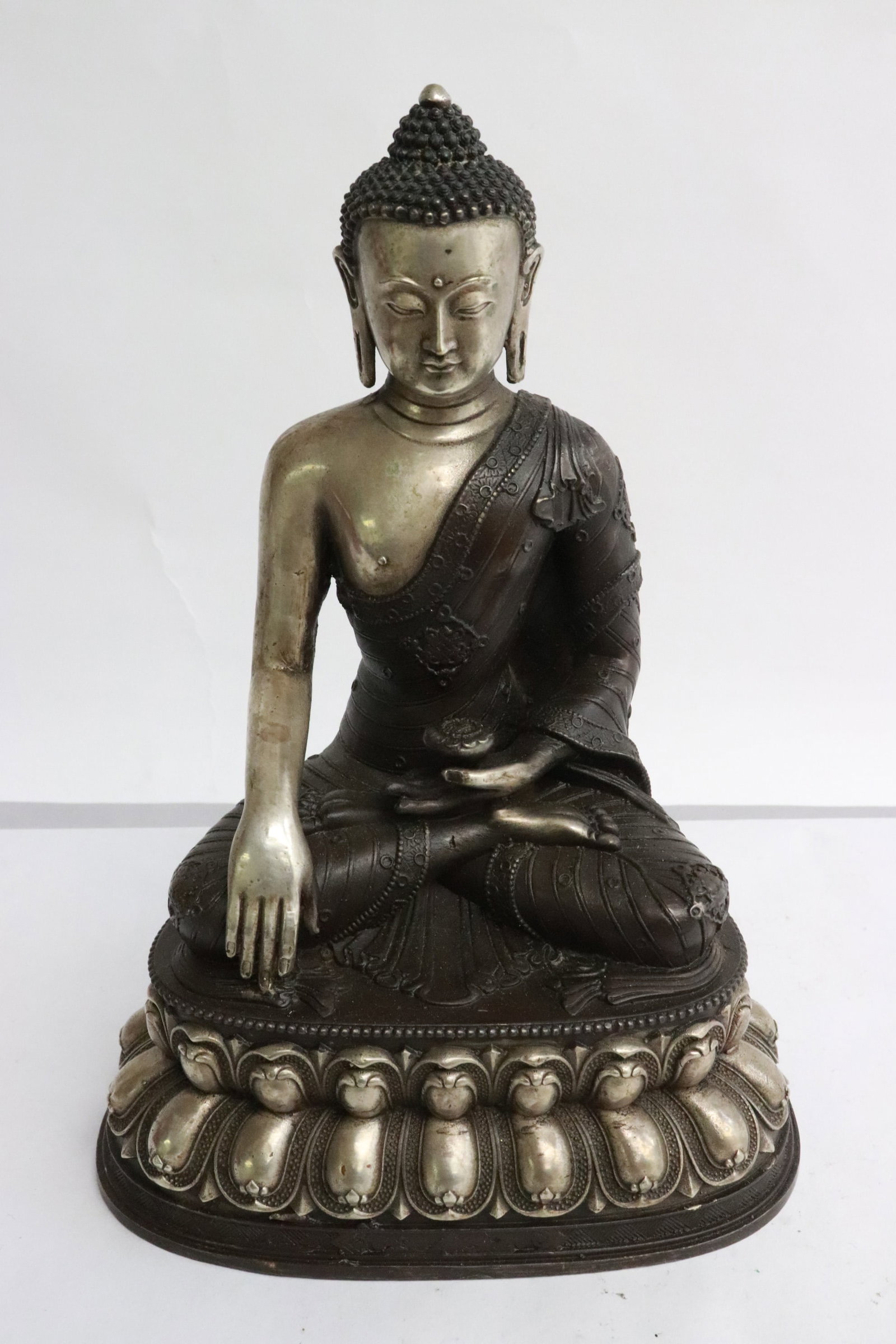 Chinese white bronze sculpture of deity (1 of 7)
