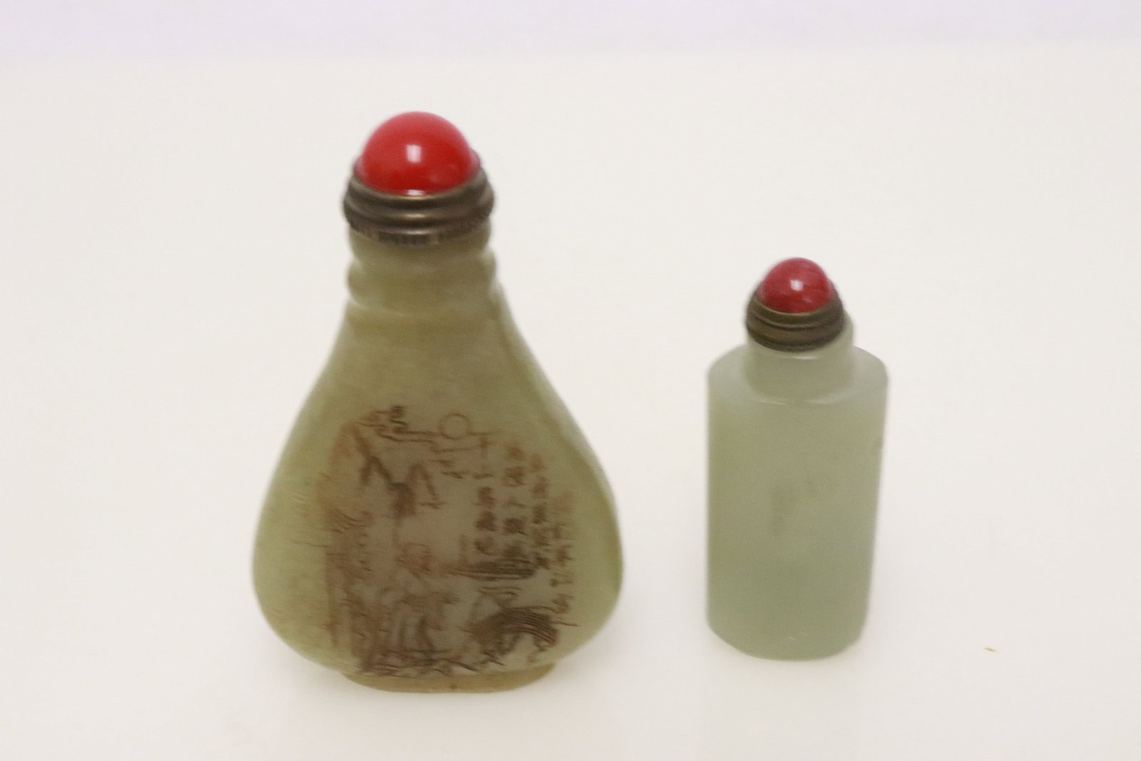 2 stone carved snuff bottle: 2 stone carved snuff bottle, 2"x0.75"x0.4", 2.75"x1.65"x0.6"