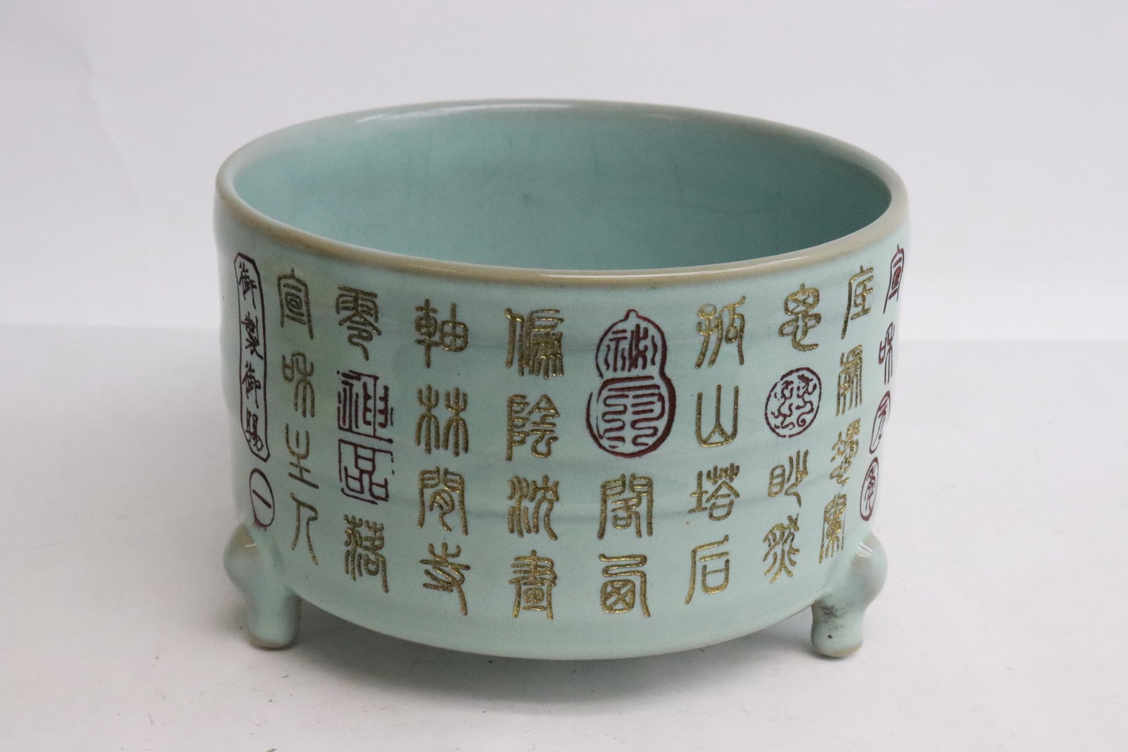 Celadon tripod censer with calligraphy: Celadon tripod censer with calligraphy, 3.65"x5.3"x5.3"