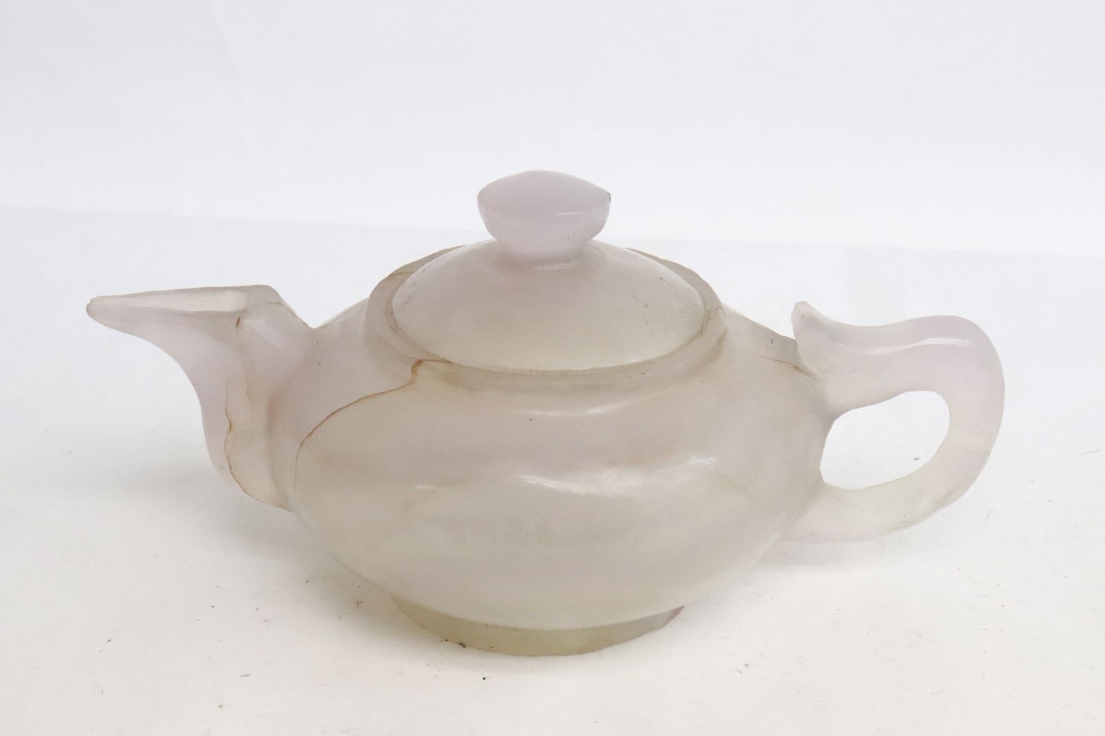 Unusual crystal carved teapot: Unusual crystal carved teapot, 3"x6.15"x3.65"