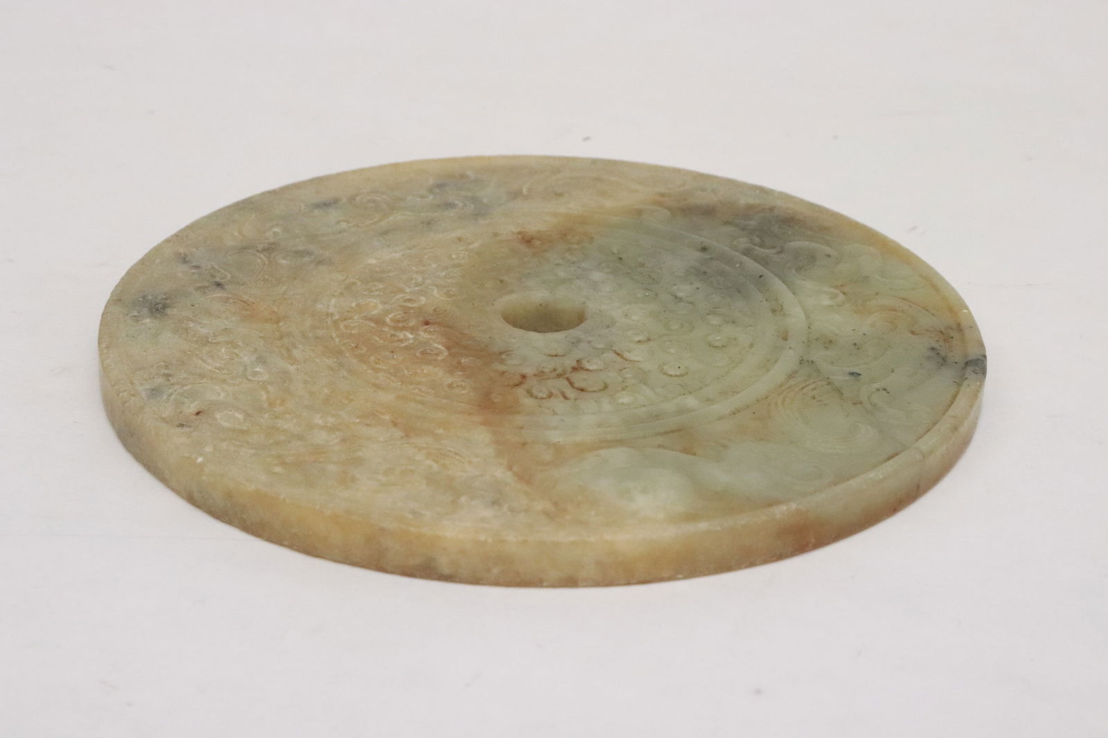 2 large jade like stone discs - 9