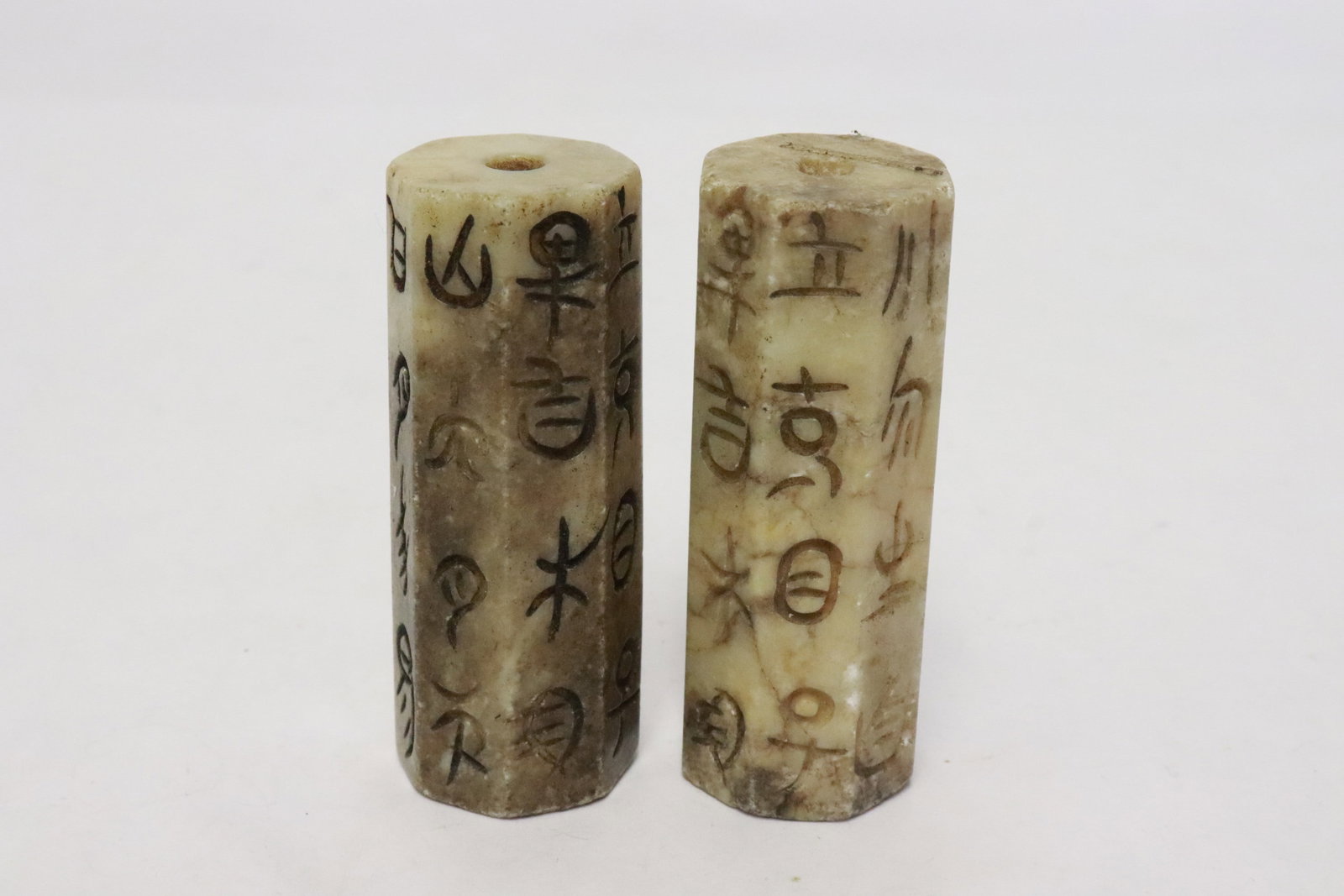 2 jade like stone beads with calligraphy: 2 jade like stone beads with calligraphy, 2.85"x1"x1" ea