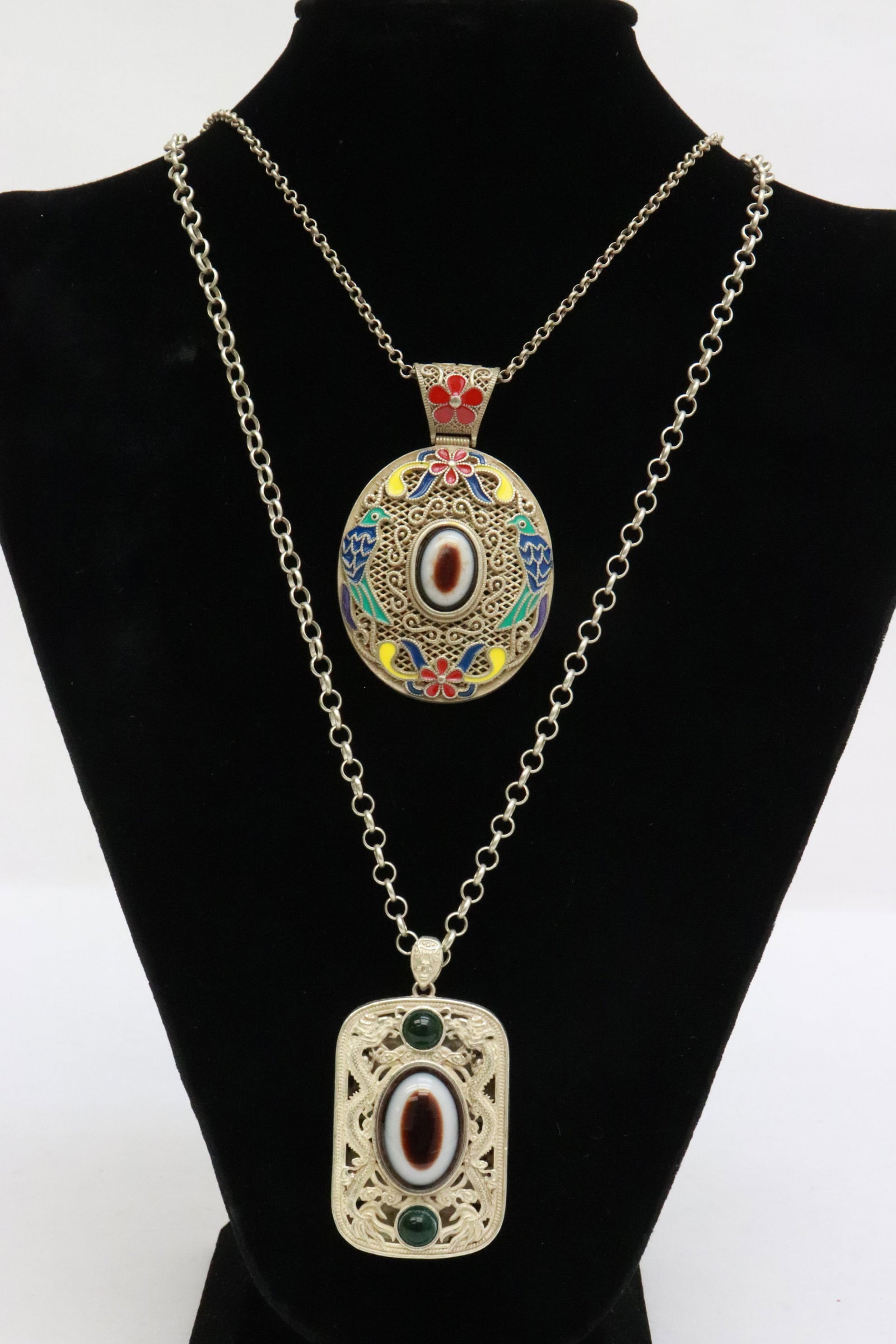 2 white metal pendant with necklace: 2 white metal pendant (2.25"x1.4"x0.75", 2.8"x1.8"x0.5") with necklace