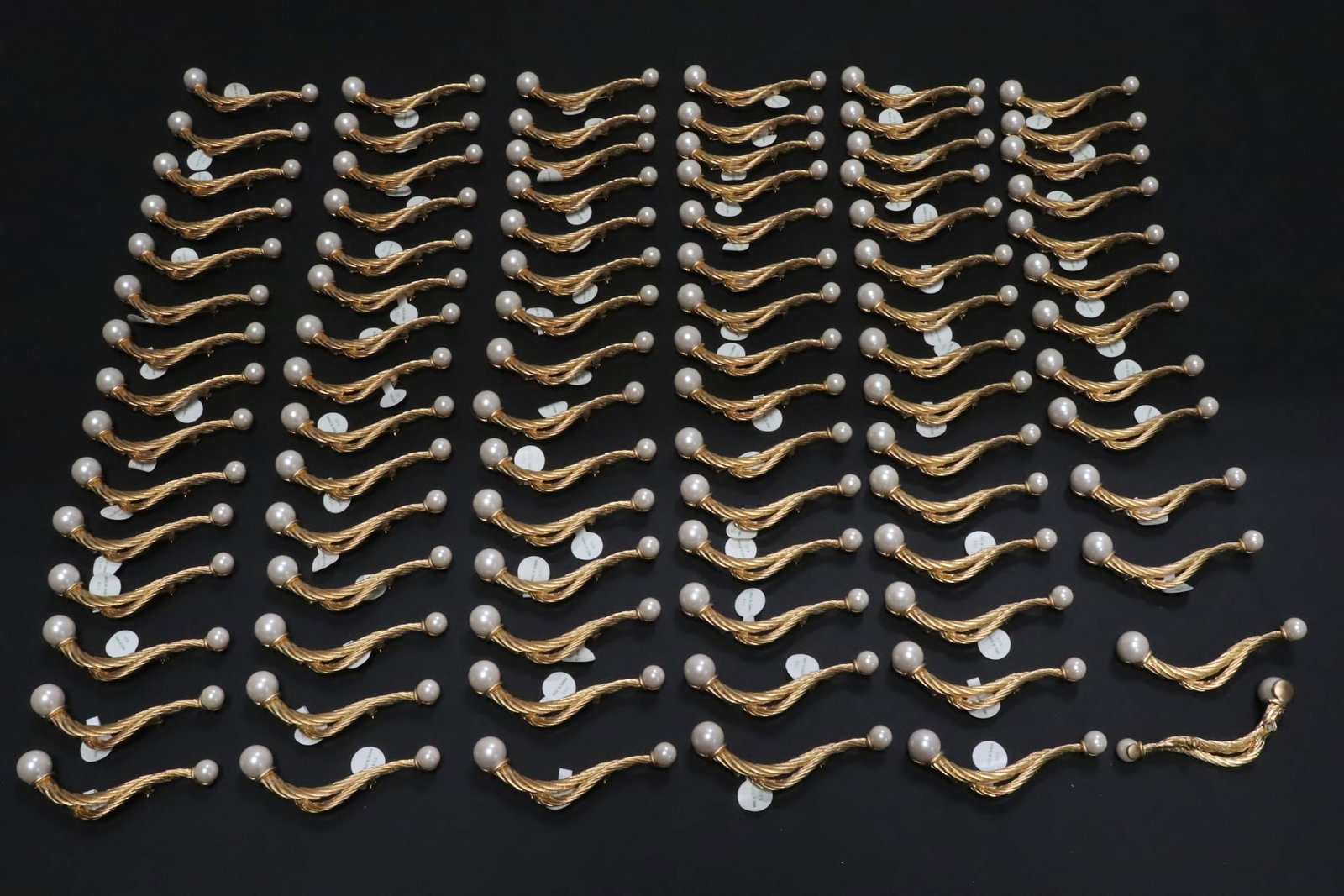 Over 80 pieces gold tone brooches: Over 80 pieces gold tone brooches, 3.3"L ea