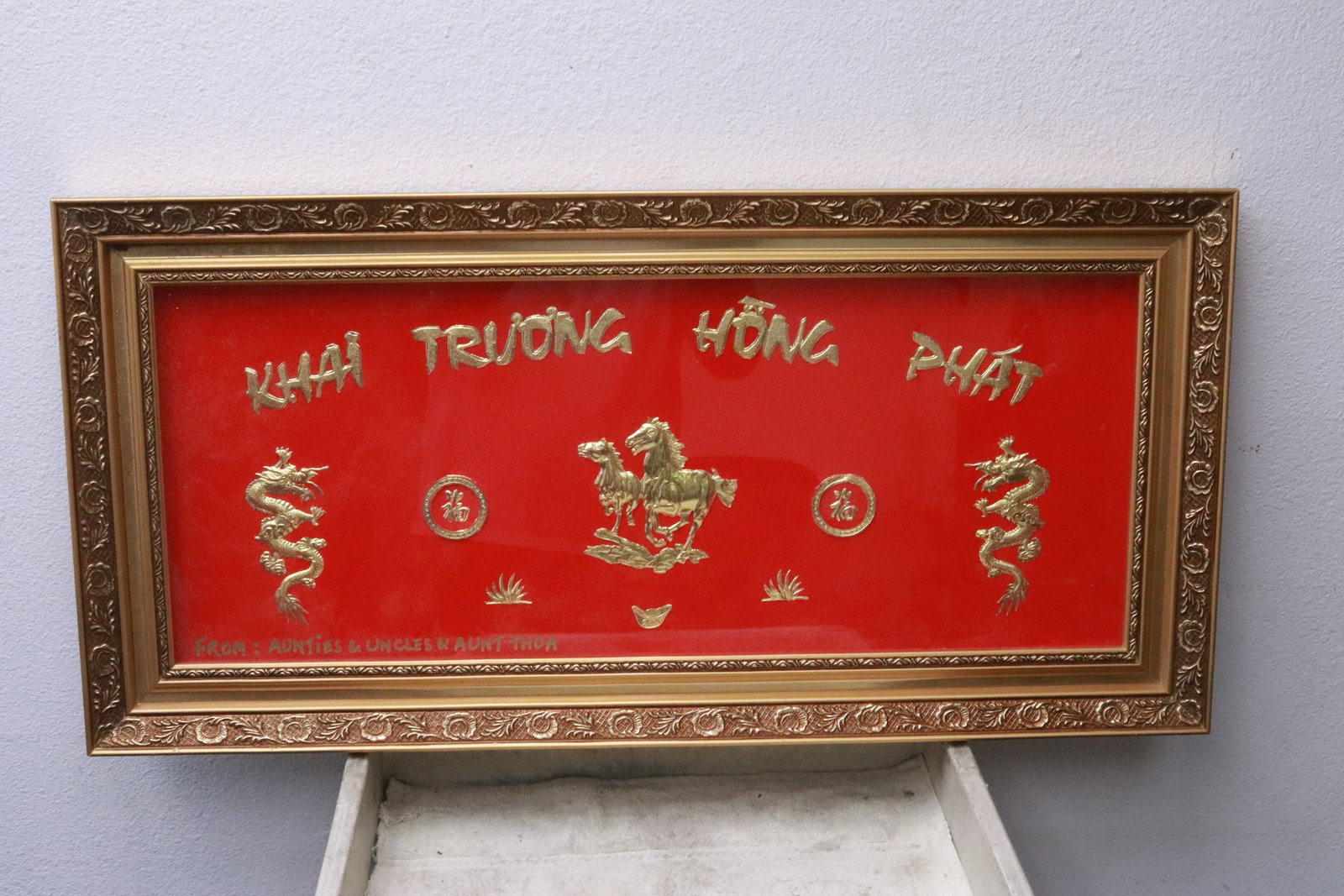 Framed panel of gold foil decoration (1 of 4)
