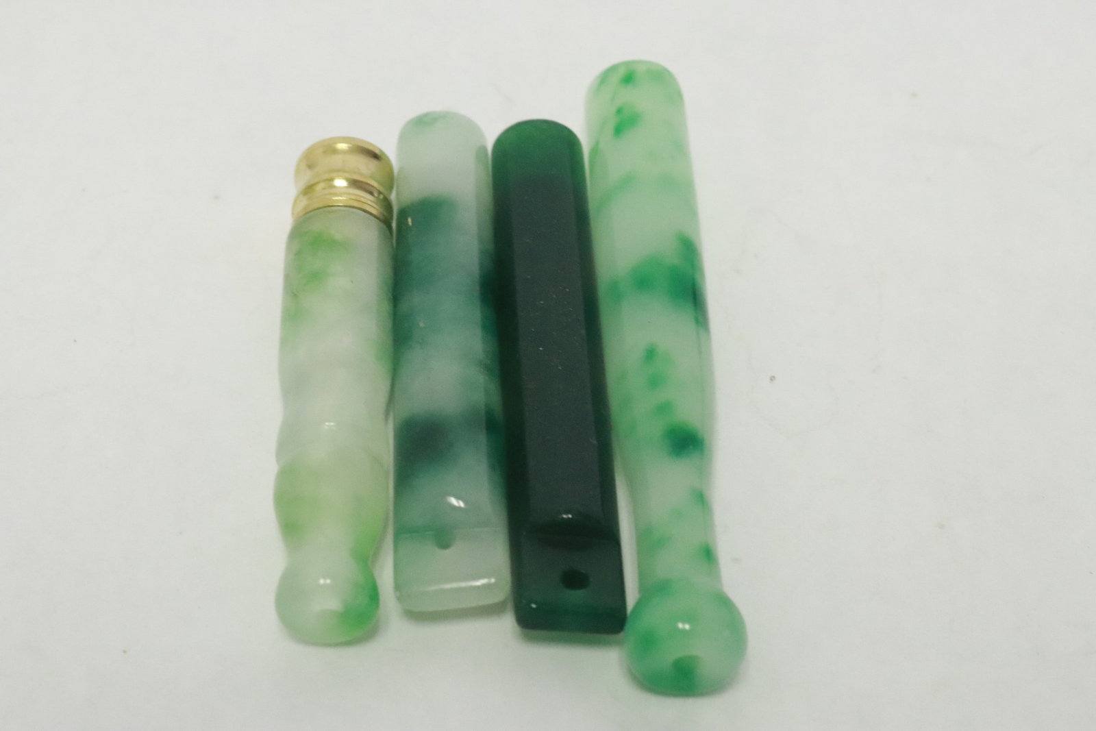 4 jadeite like cigarette holders - 4