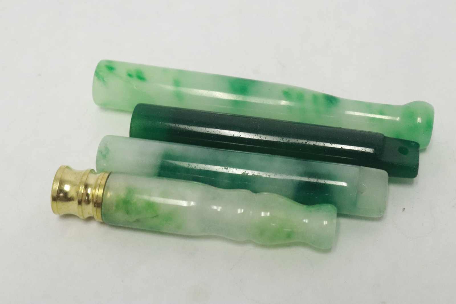 4 jadeite like cigarette holders - 5
