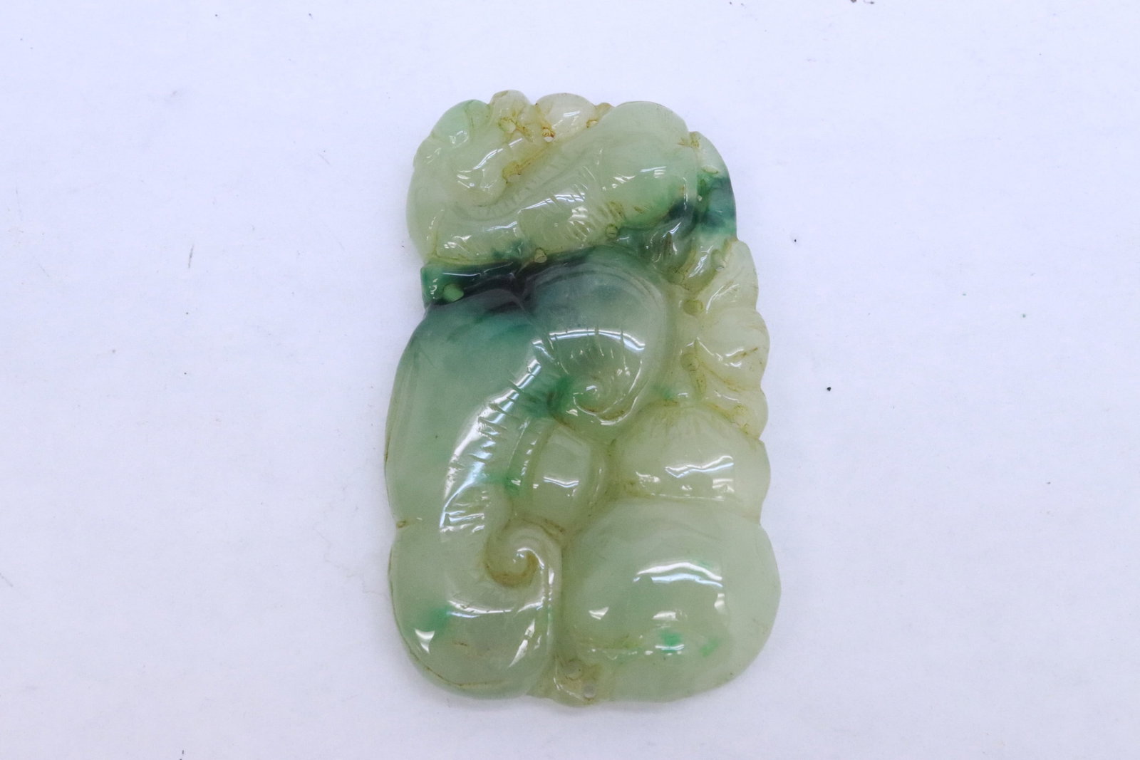 A jadeite like stone carved ornament: A jadeite like stone carved ornament, 2.8"x1.68"x0.4"