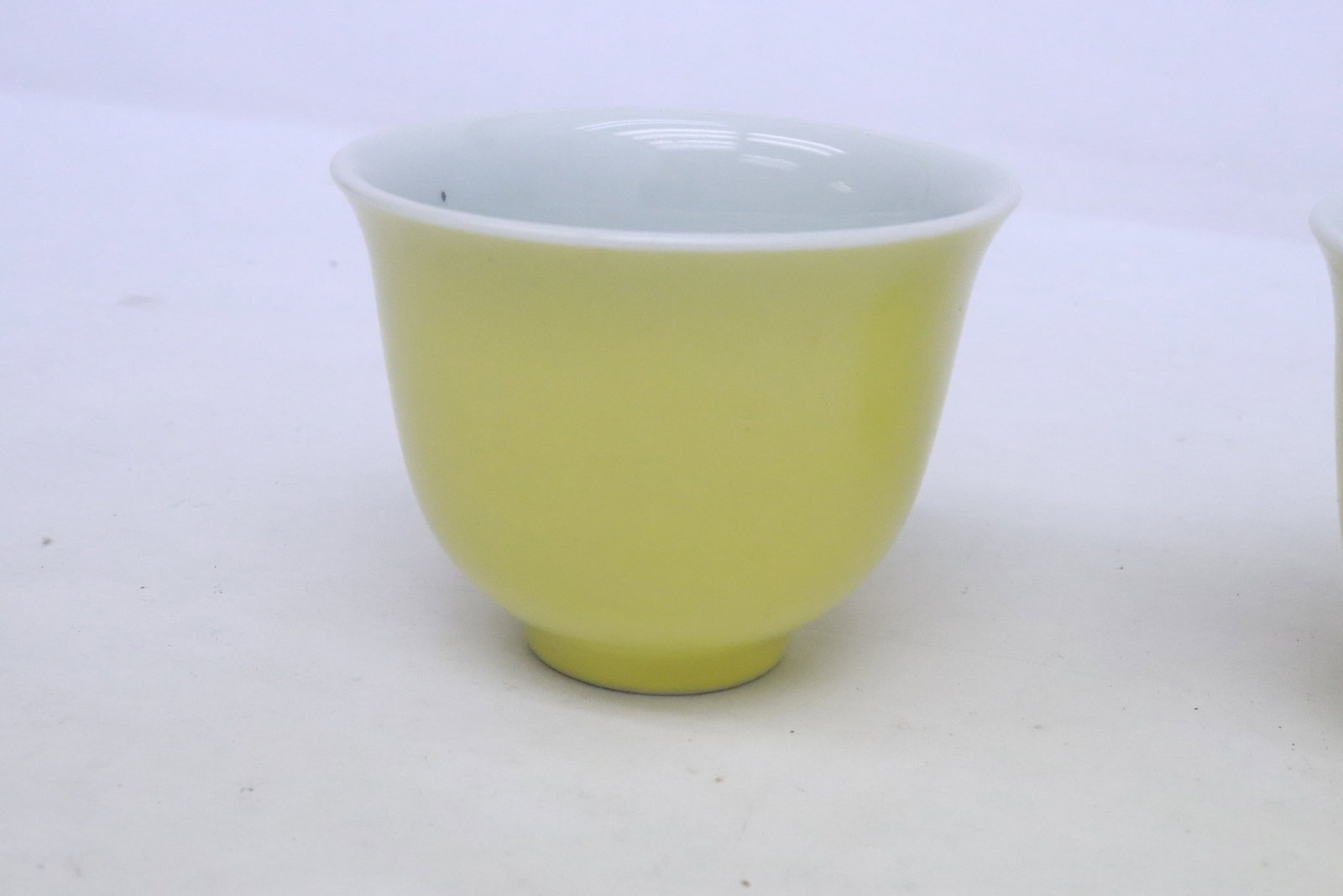 2 yellow glazed tea cups - 4