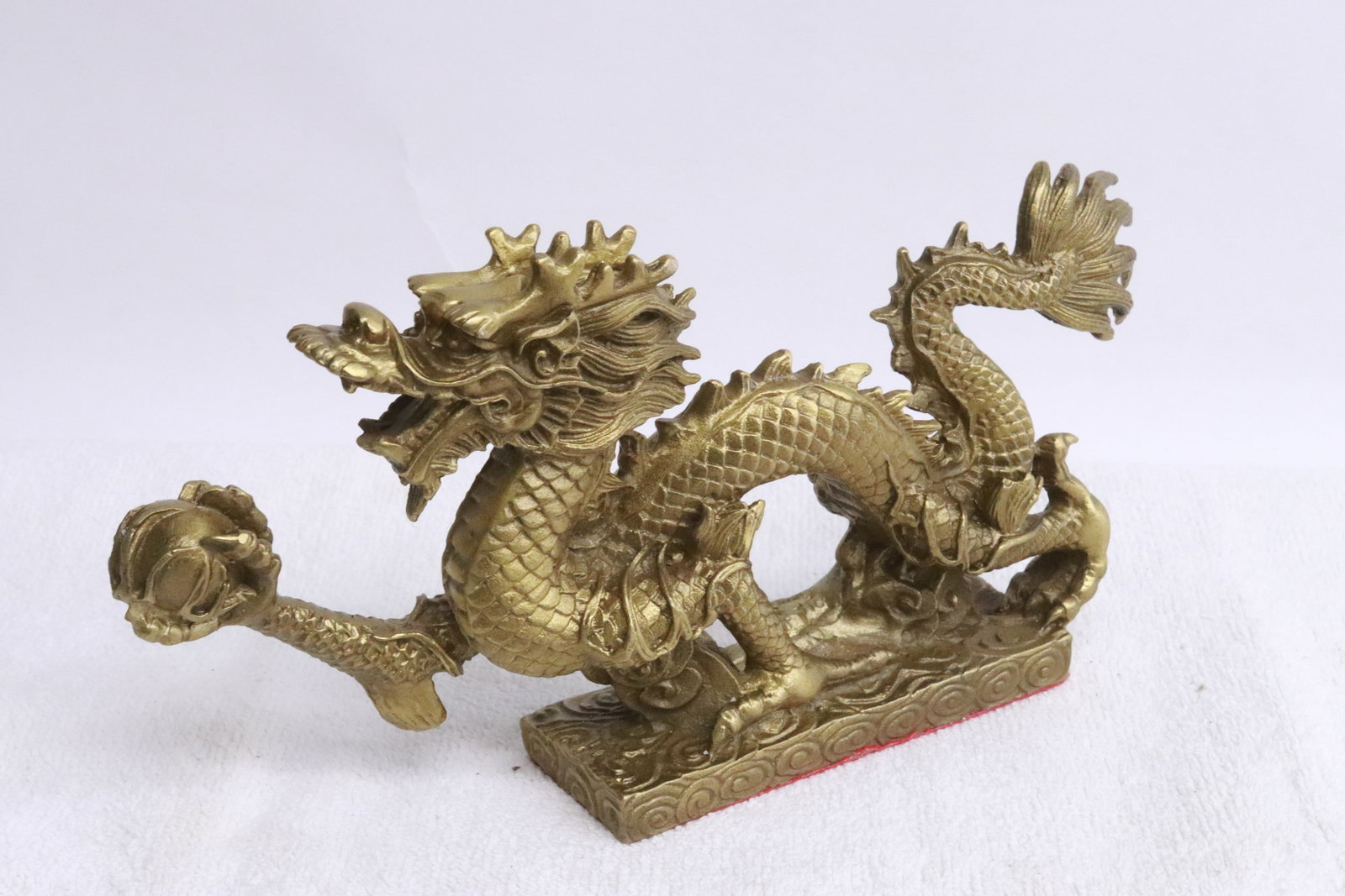 Gilt metal sculpture of dragon: Gilt metal sculpture of dragon, 4.35"x8.3"x1.7"
