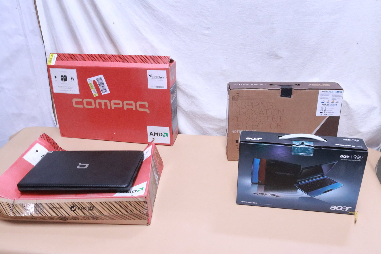 4 laptop computers, all NIB: 4 laptop computers, all NIB; 2 Compaq Presario, one Acer Aspire One, and one Asus Notebook