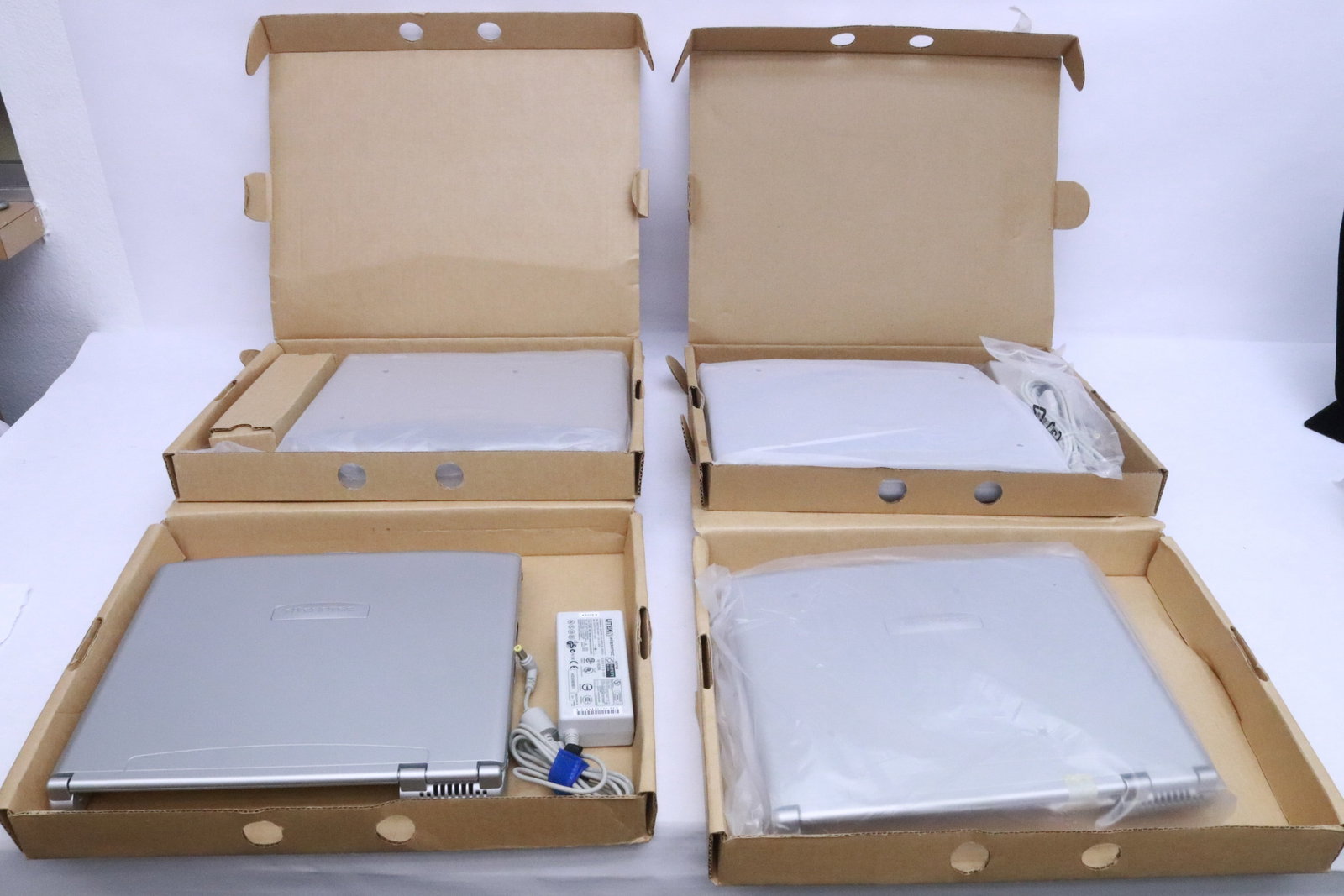 4 Averatec laptop computers: 4 Averatec laptop computers, all NIB, 2 have no power supply