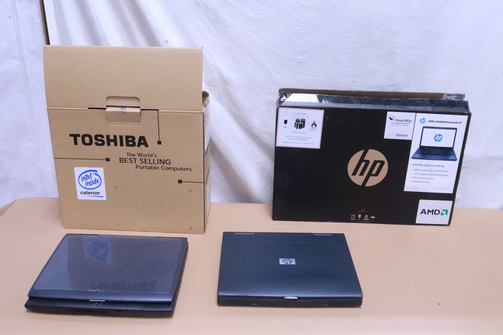3 laptop computers: 2 HP laptop computers (all NIB), and one Toshiba laptop computer