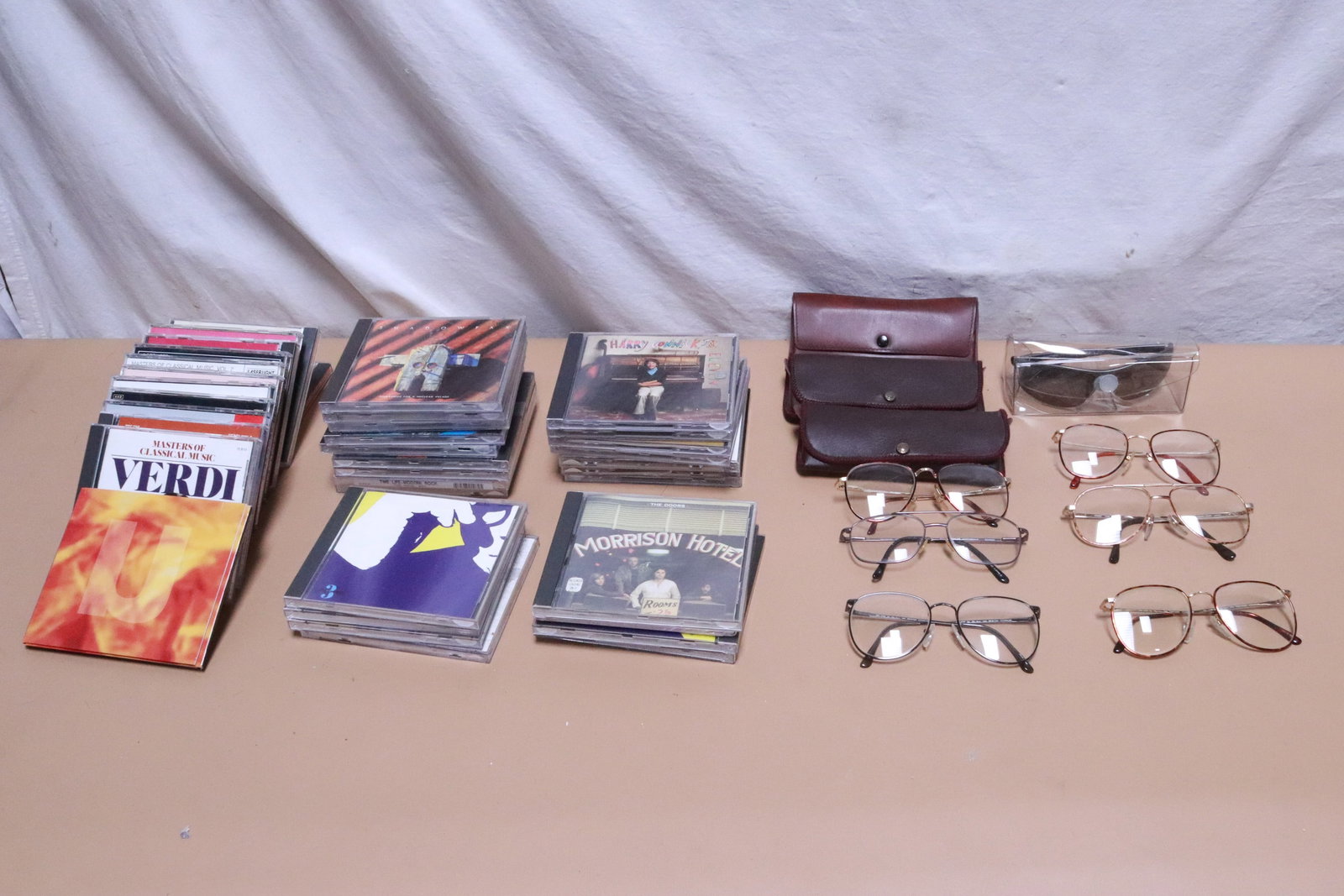 Lot of CD's, and men's glasses, sunglasses (1 of 6)
