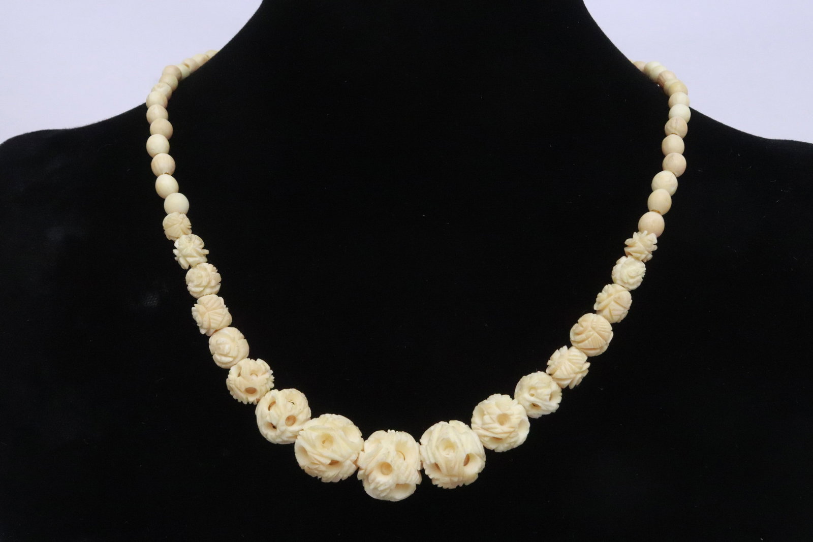 Vintage bone carved bead necklace: Vintage bone carved bead (0.18"x0.15"dia - 0.6"x0.63"dia) necklace (32"L)