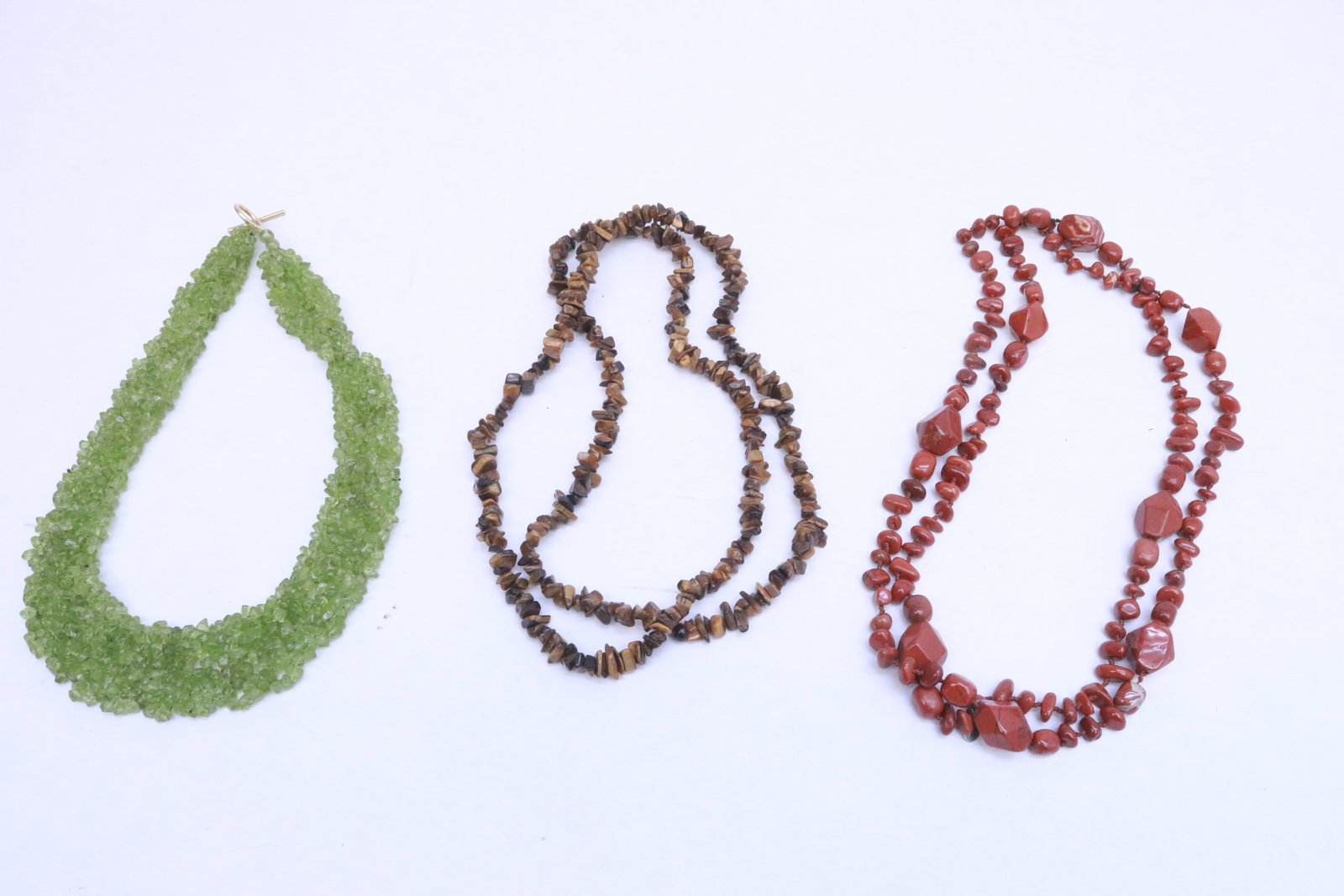 3 necklaces; jasper bead, tiger eye beds, & peridot beads: 3 necklaces (17.7"L - 43.5"L); jasper bead, tiger eye beds, and peridot beads