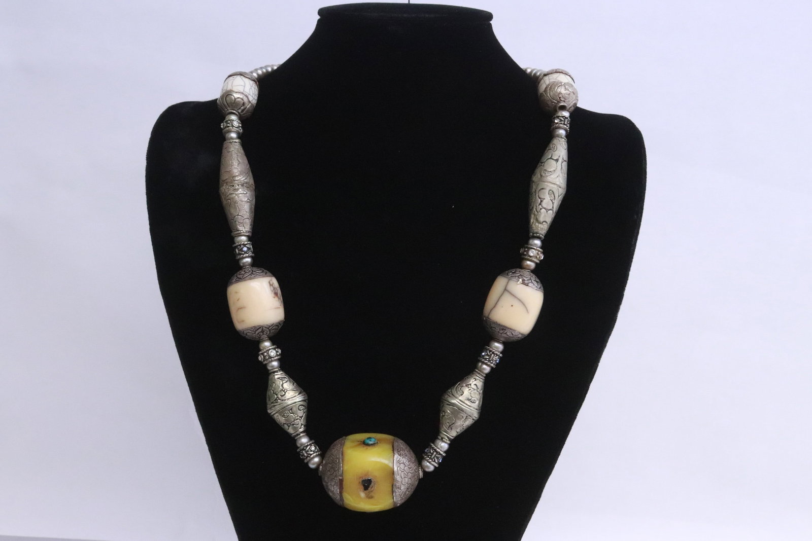 A freshwater pearl and bone like bead necklace: A freshwater pearl and bone like bead necklace, 24.5"L