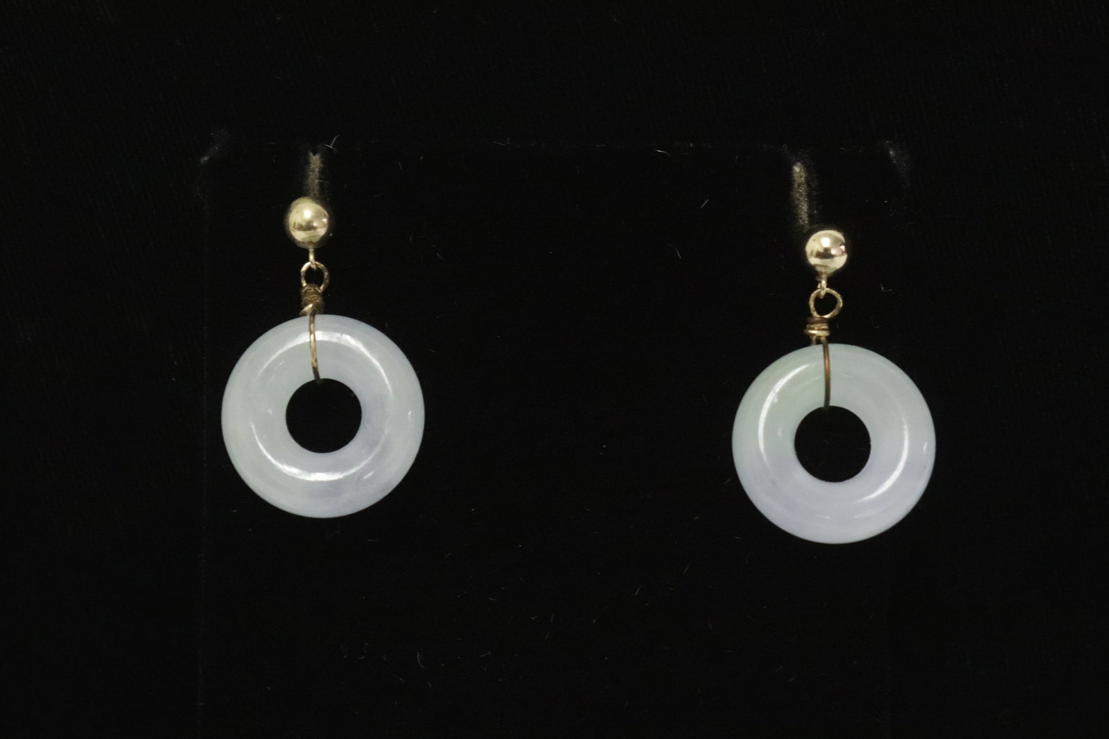 Pair 14K Y/G earrings with white jade disc: Pair 14K Y/G earrings with white jade disc (0.25"x0.7"dia ea), wt. 7.8gm