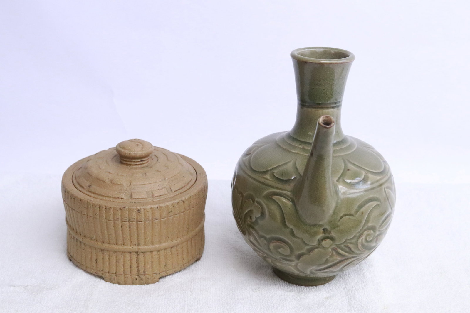 A Yixing tea caddy, and a celadon wine server (1 of 9)