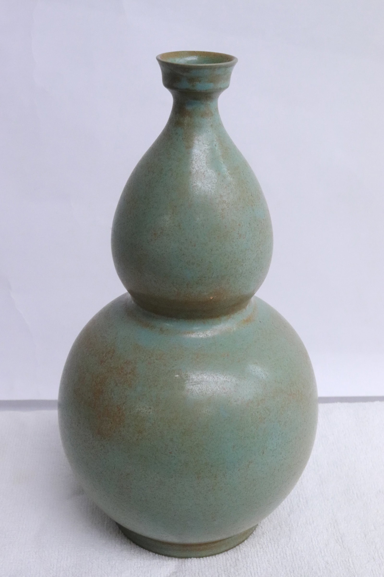 A celadon gourd shape porcelain vase (1 of 9)