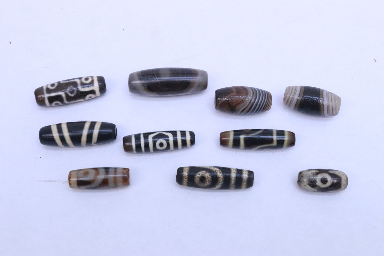 Lot of beads: Lot of beads, 0.9"x0.4"dia - 1.68"x0.63"dia