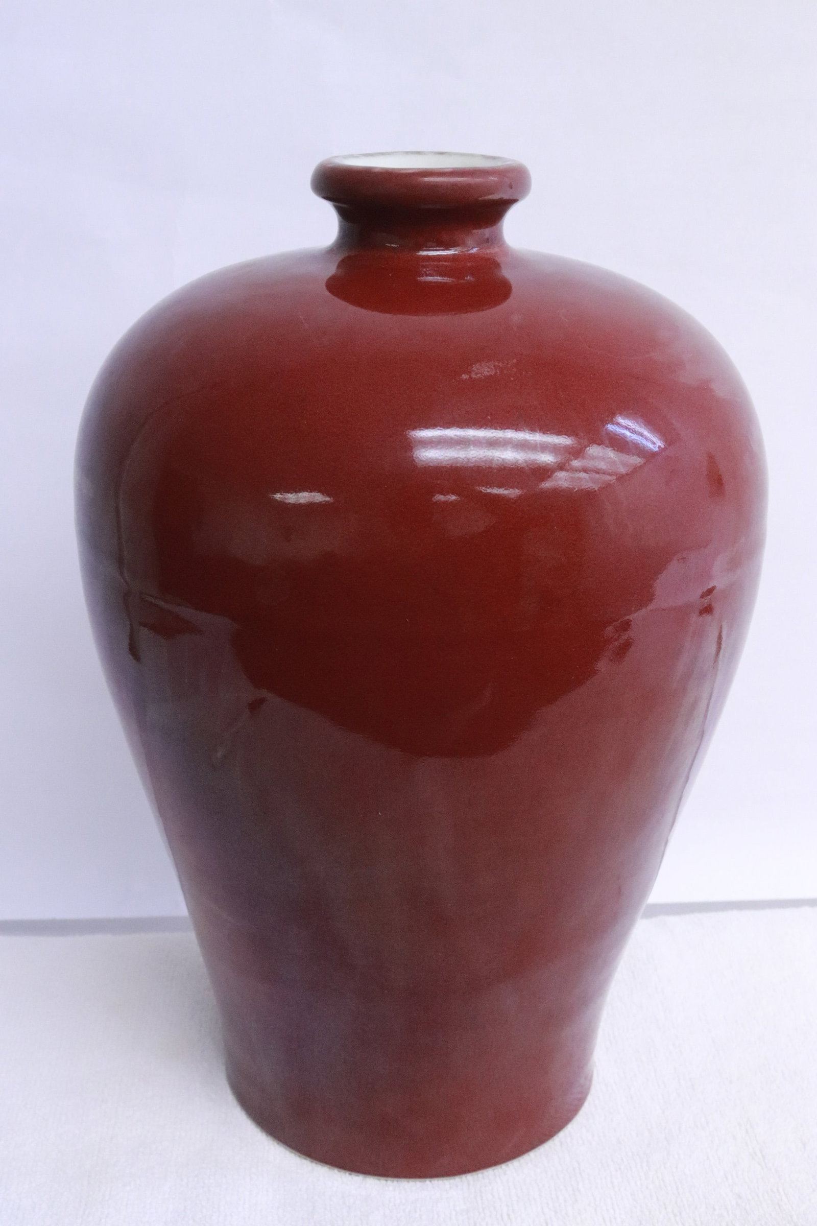Large red glazed porcelain meiping: Large red glazed porcelain meiping, 11.8"x8"dia