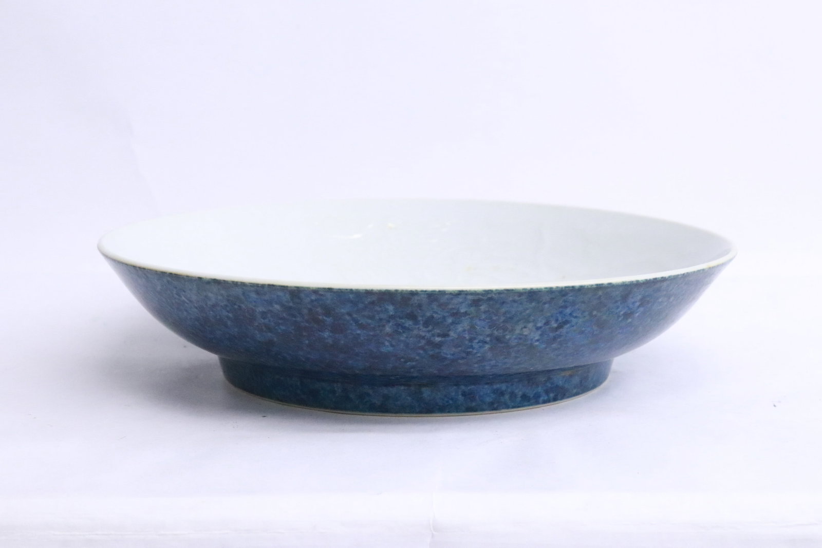 Fine blue glazed porcelain plate: Fine blue glazed porcelain plate, 1.85"x8.15"dia