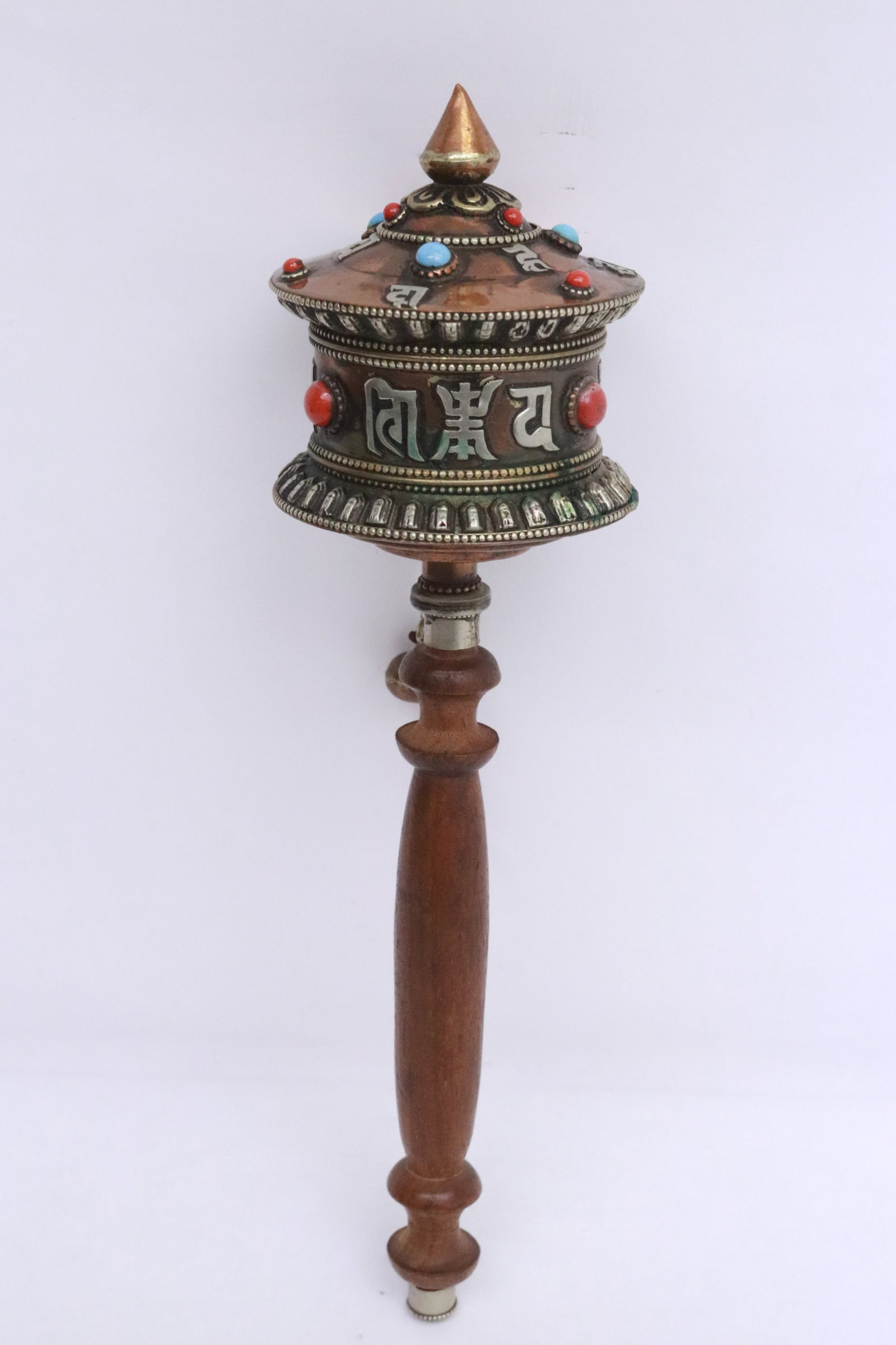 A Tibetan praying wheel: A Tibetan praying wheel, 11.7"L