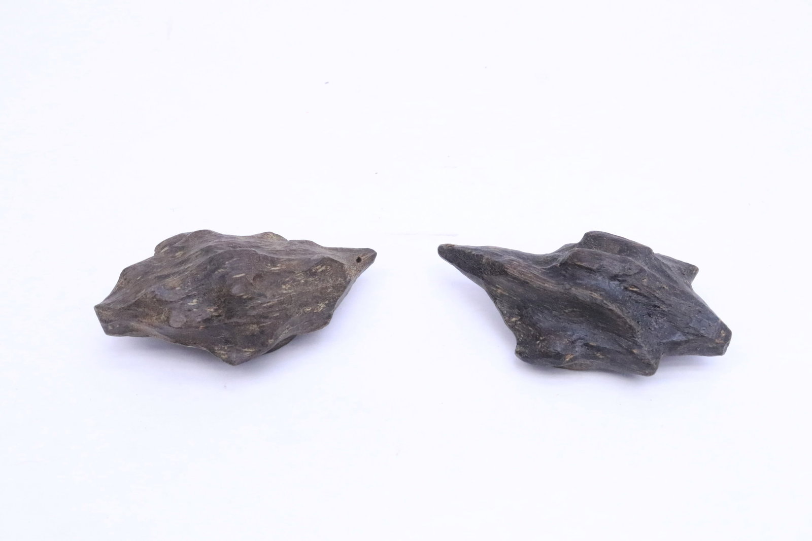 2 wood nuts(?) - 4