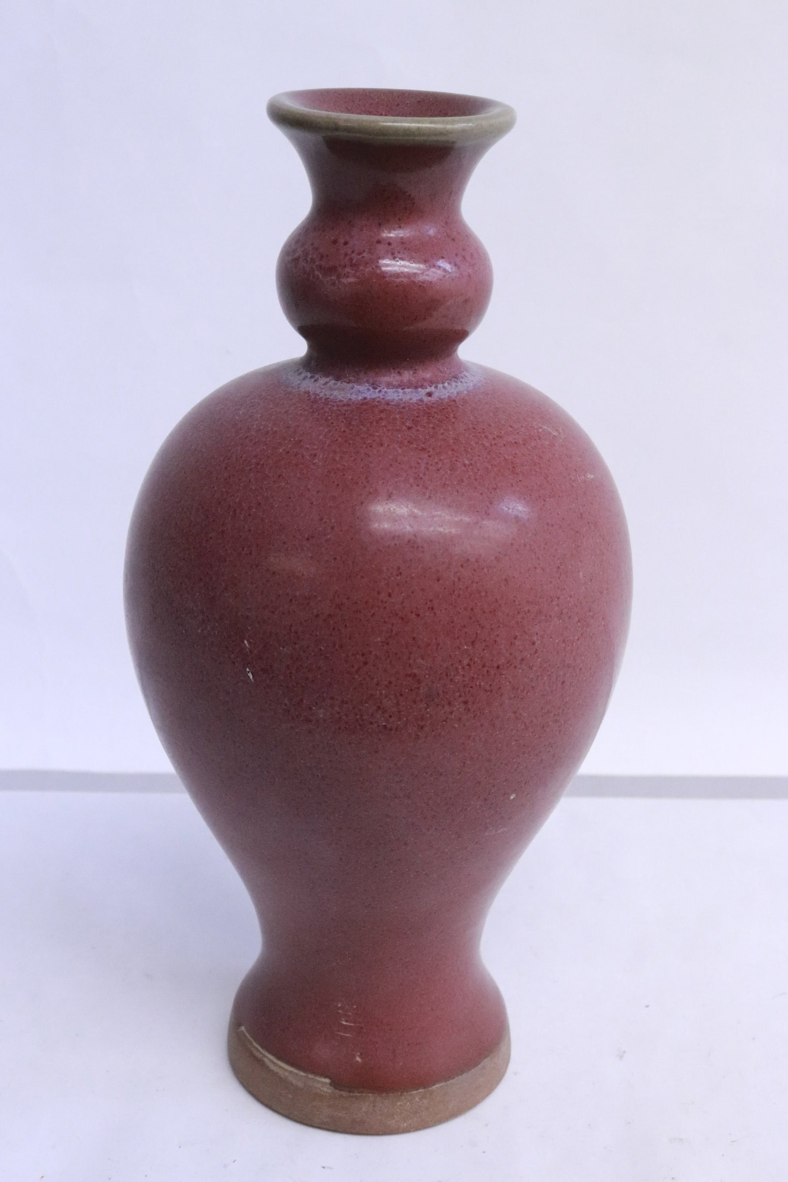 A purple glazed porcelain vase (1 of 6)