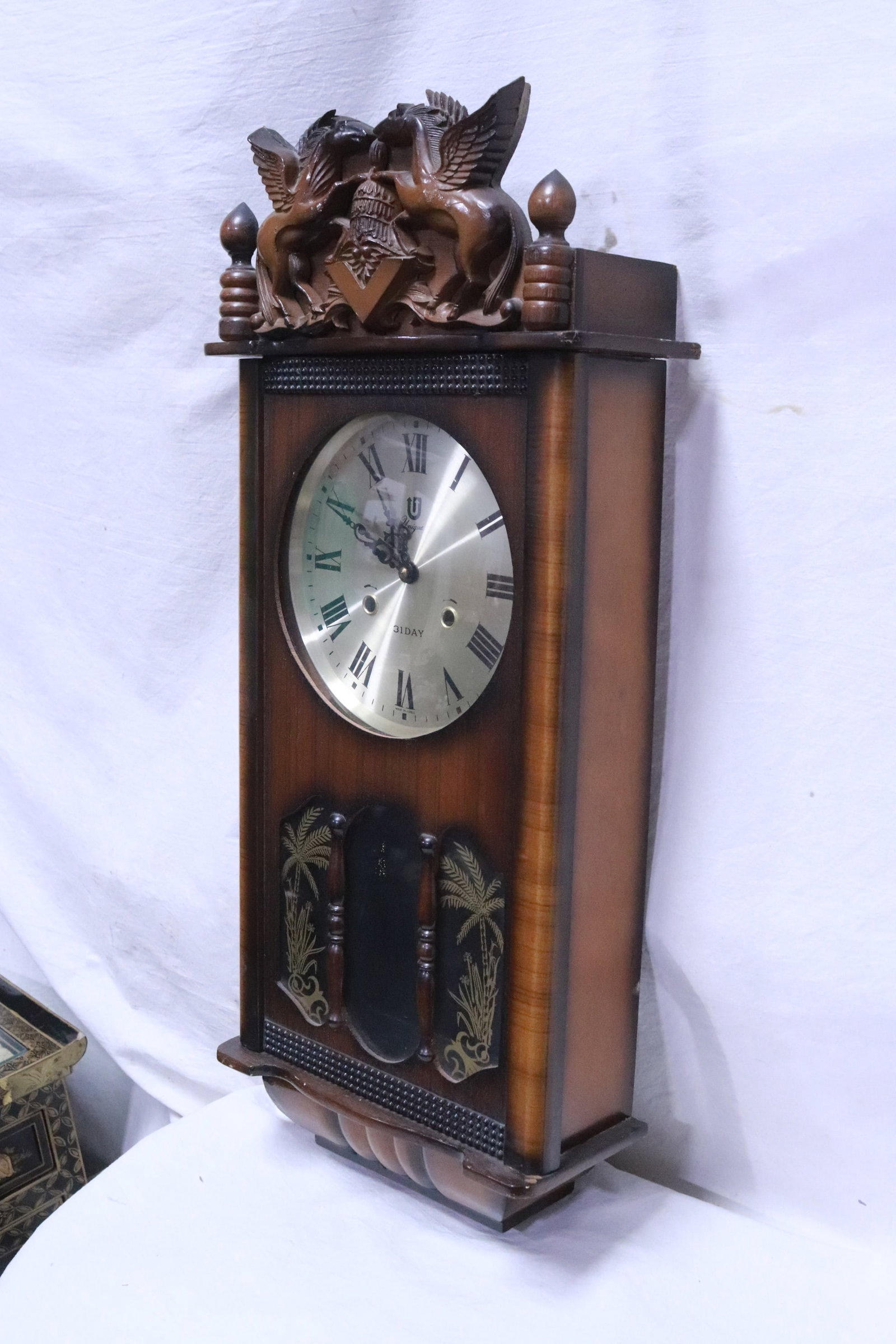 A 31-day key wind wall clock - 5