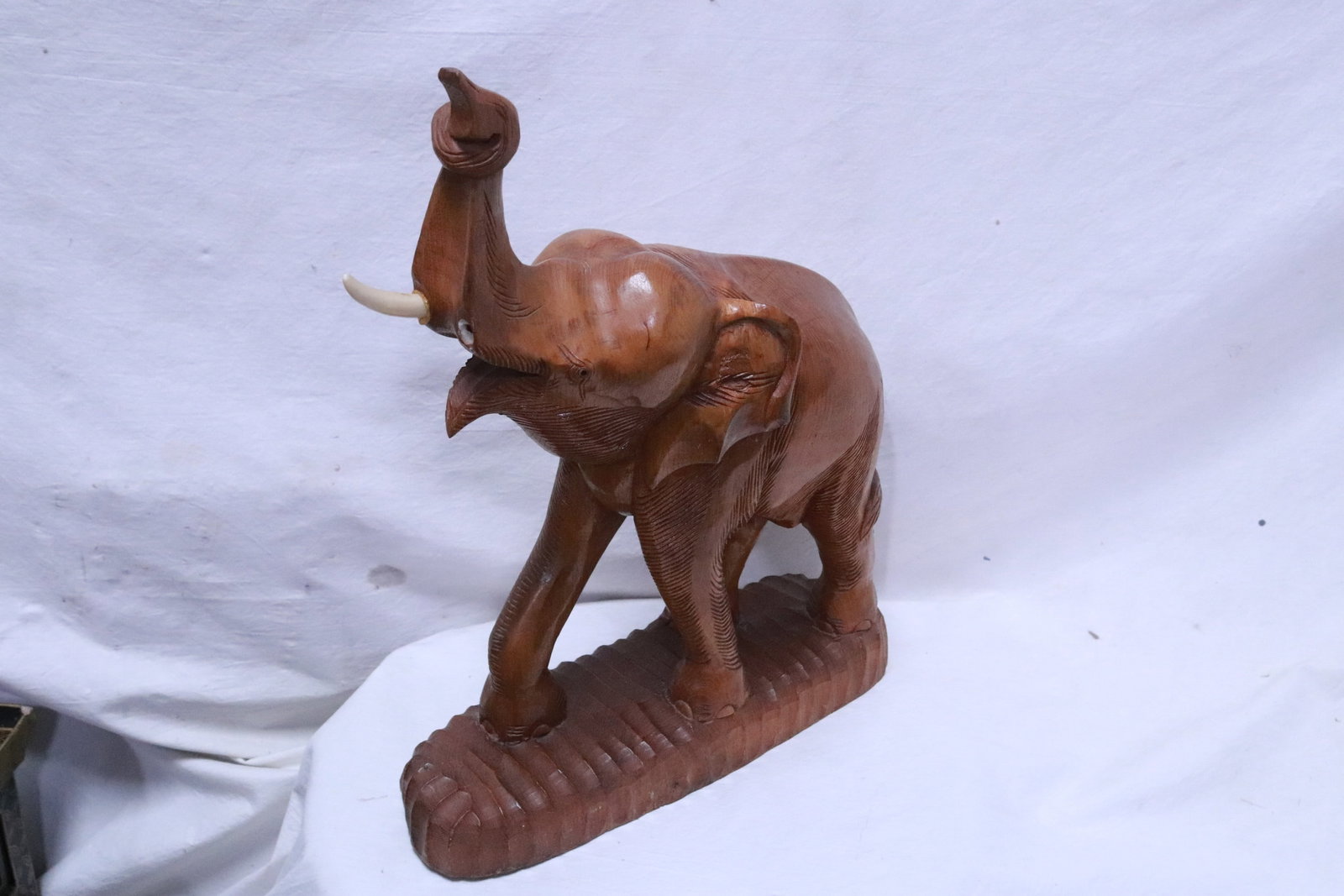 Large wood carved elephant, one tusk broken (1 of 6)