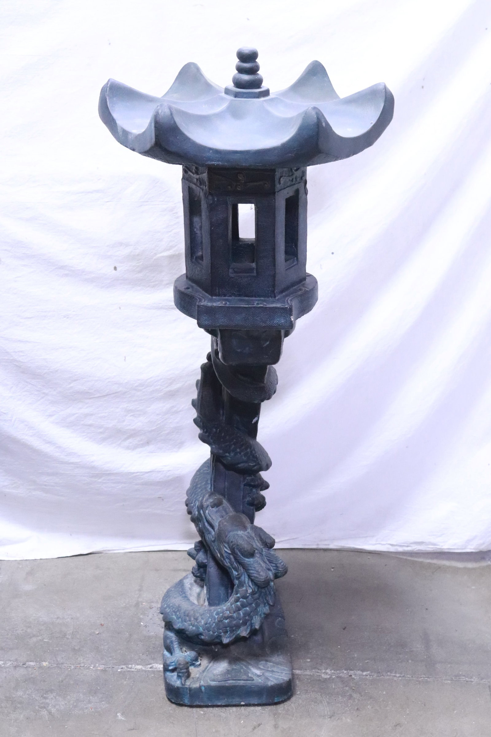 A stone like garden lamp with base in dragon motif: A stone like garden lamp with base in dragon motif, need wiring, 41.7"H