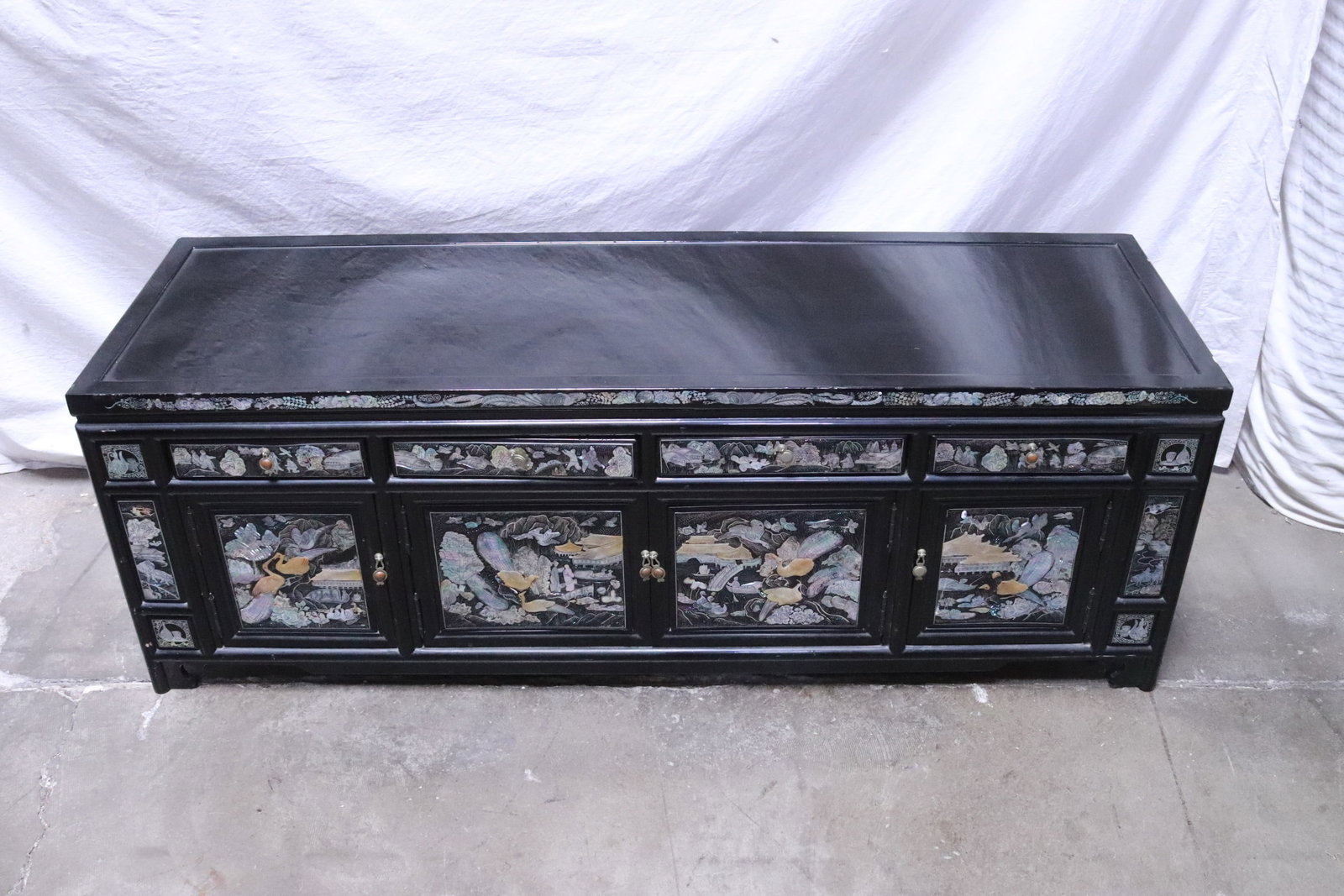 black lacquer low chest w/ mother of pearl inlaid: Beautiful black lacquer low chest with mother of pearl inlaid to depict crane scene, 15.8"x45.85"x14.5"