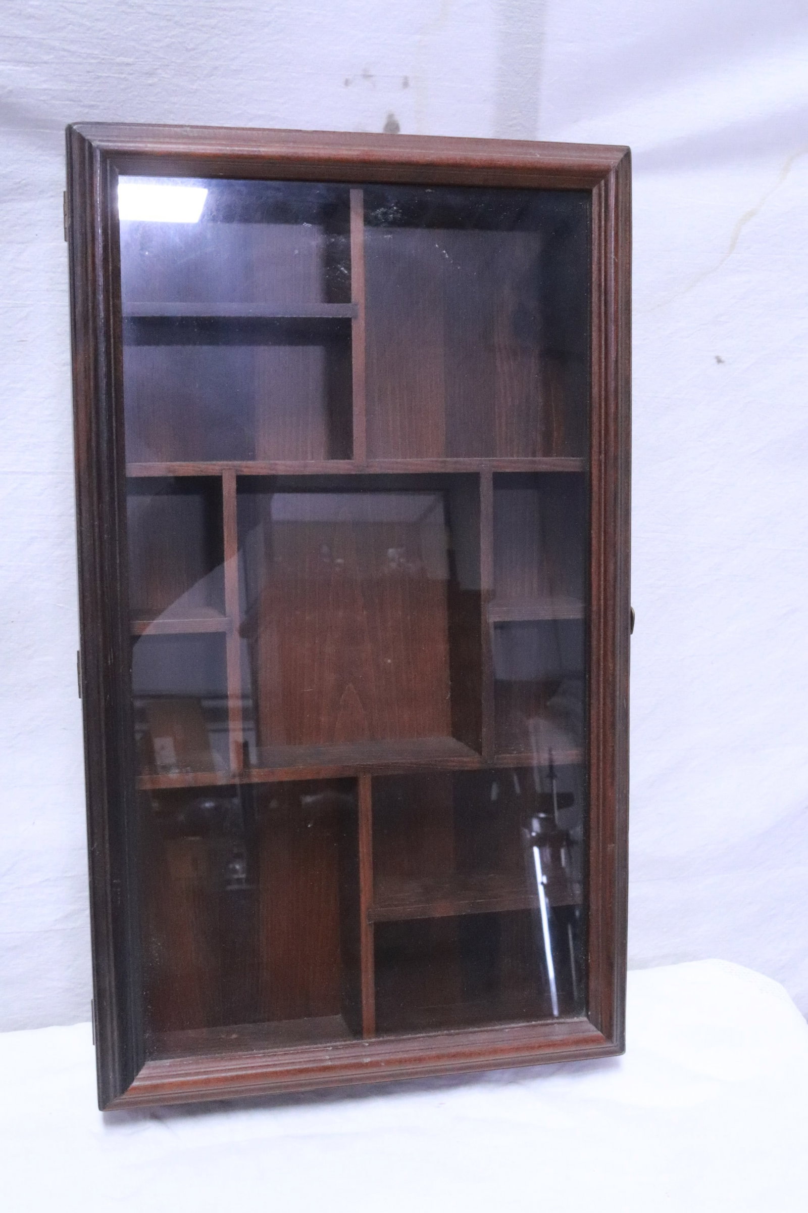 A wall hanging display case: A wall hanging display case, 20.35"x11.85"x3.5"