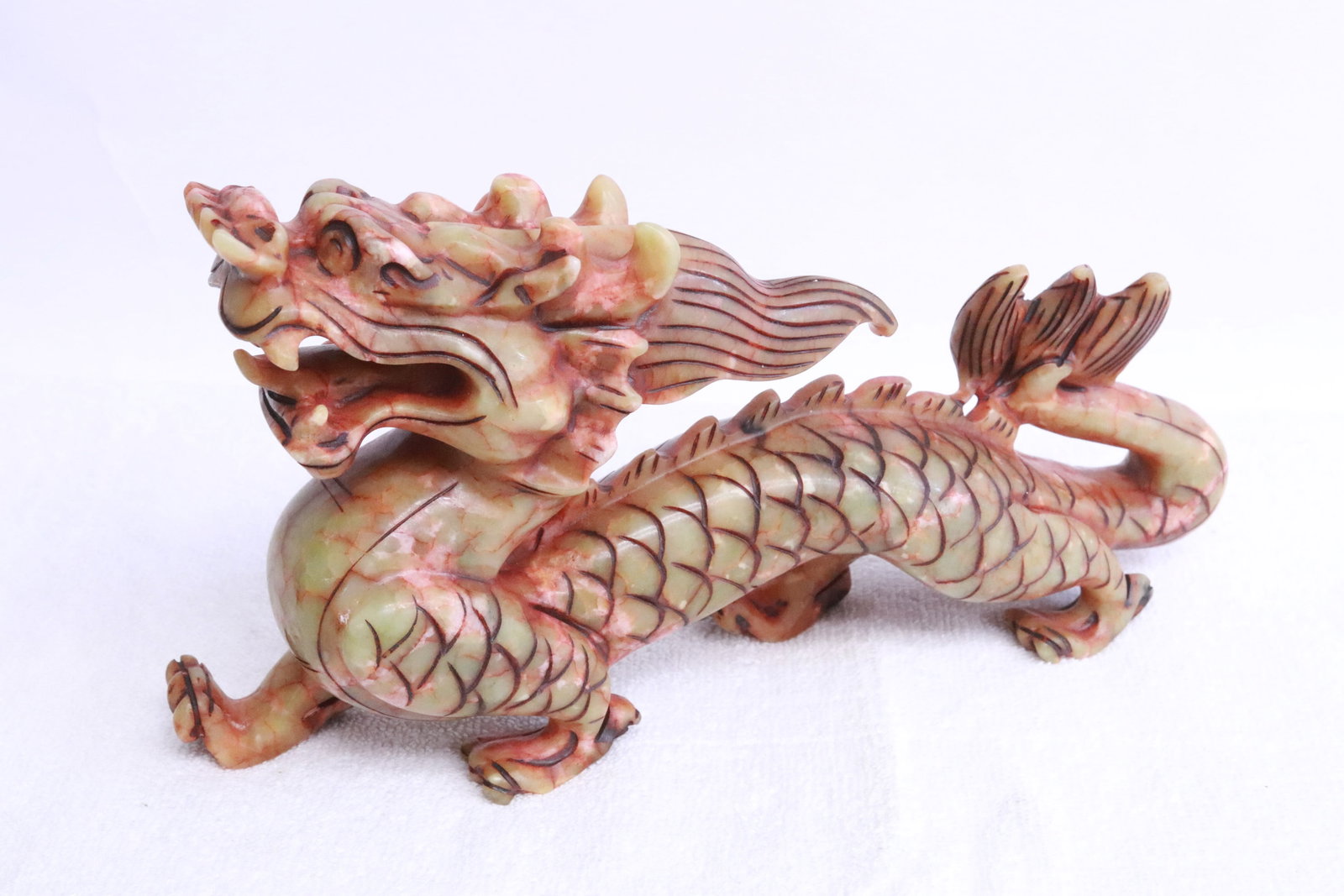 Jade like stone carved dragon (1 of 5)