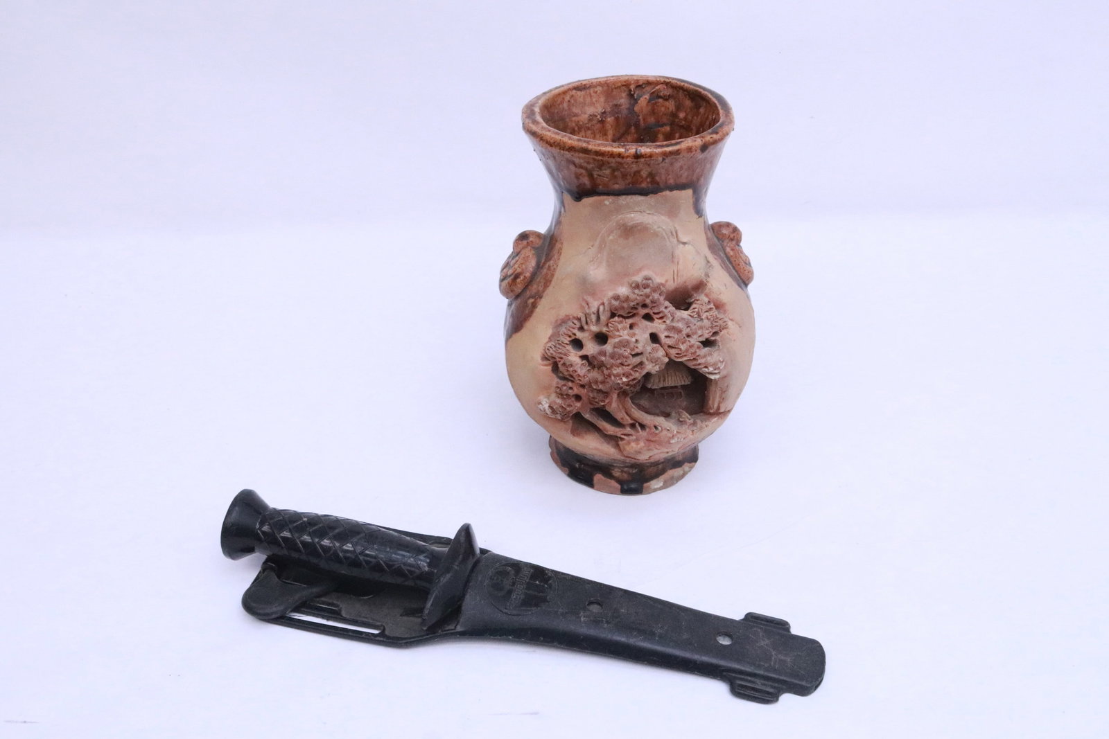 A Japanese dagger, and a Japanese pottery vase: A Japanese dagger (10.7"L), and a Japanese pottery vase (7.7"x5.15"x5.7")