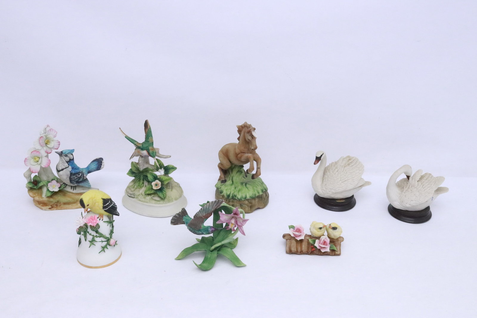 8 bisque birds, one has small chip: 8 bisque birds (2.15"H - 6.65"H), one has small chip