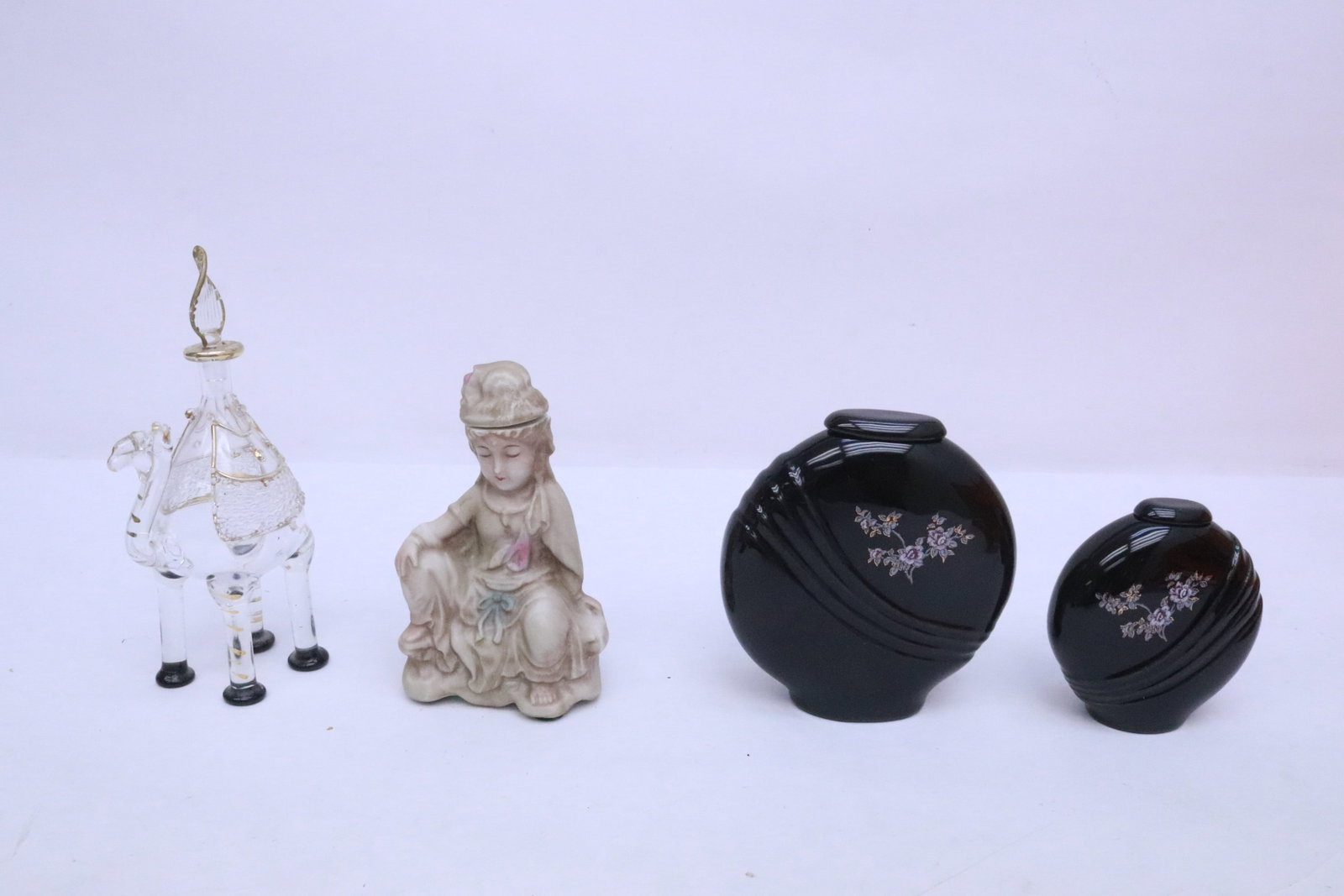 4 Asian motif perfume bottles: 4 Asian motif perfume bottles, 3"x2.9"x1.1" - 5.8"x2.9"x2"