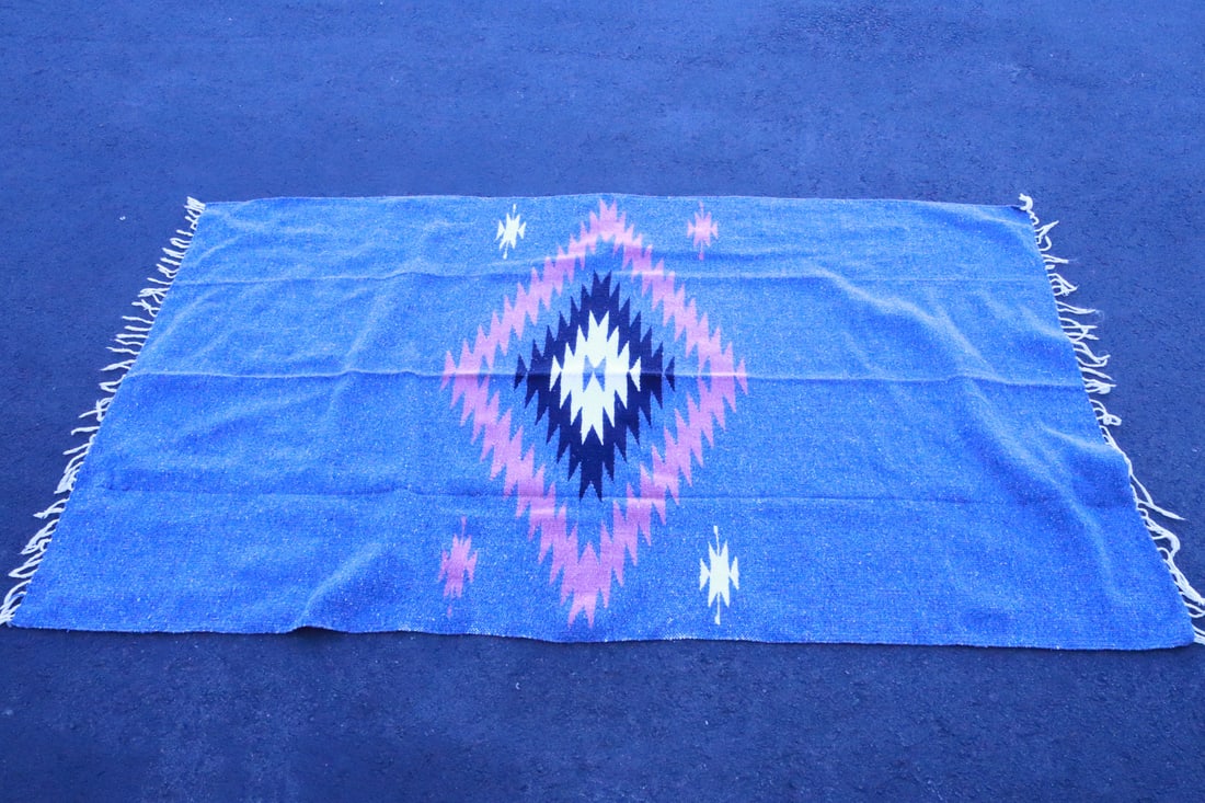 A Navajo style blanket: A Navajo style blanket, 77.5"x45.6"
