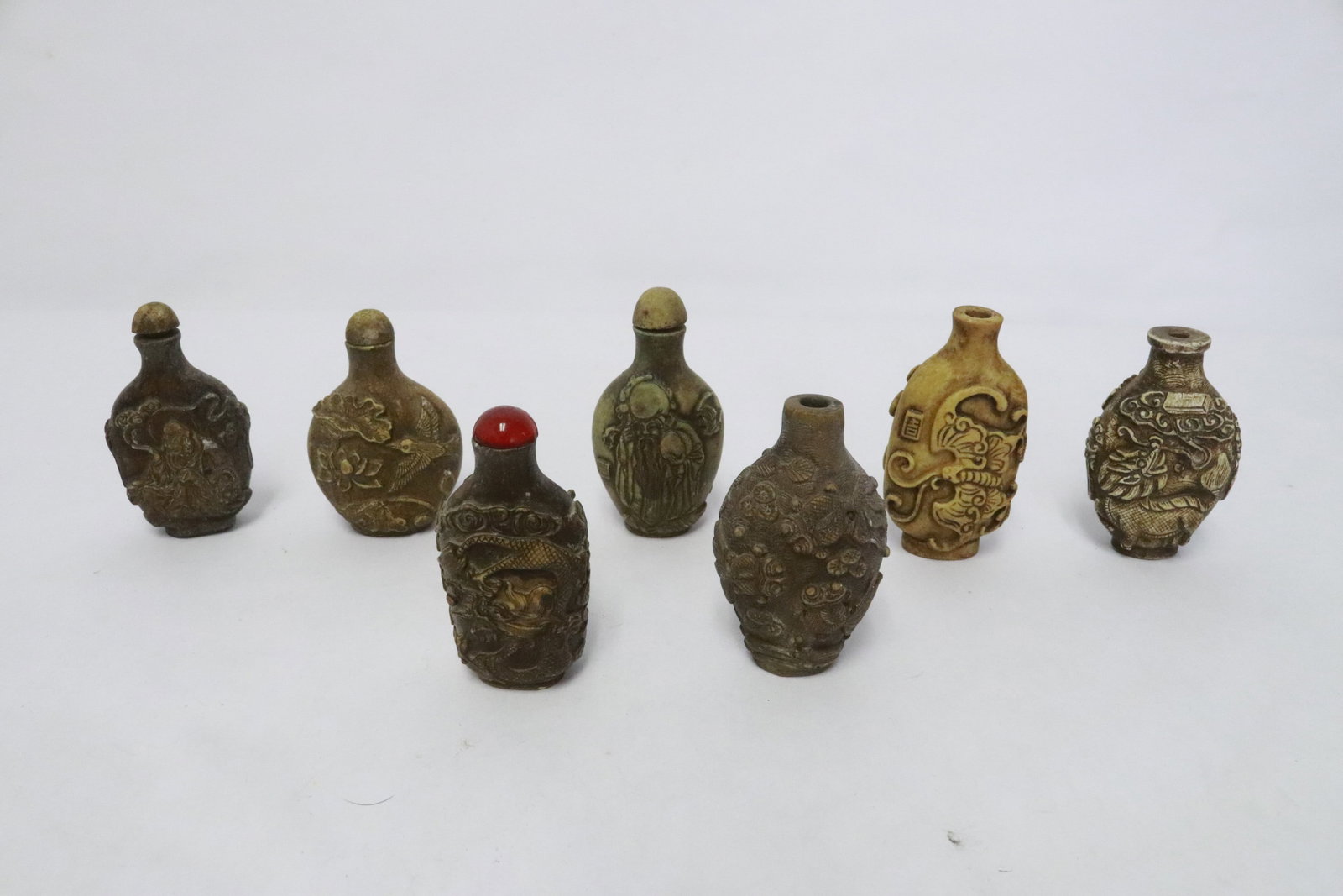 7 snuff bottles: 7 snuff bottles, 2.7"x1.8"x1" - 2.9"x1.6"x1.15"