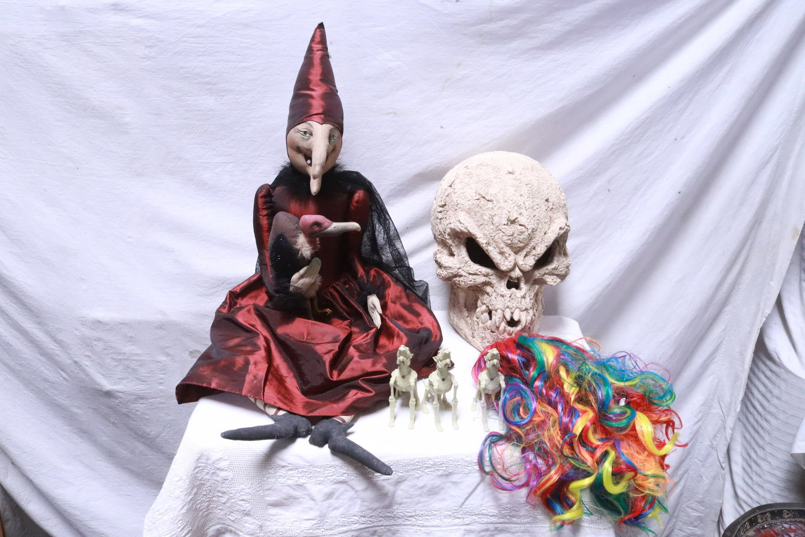Lot of halloween articles: Lot of halloween articles (5.4"H - 22"H); including a witch doll, a battery operated skull, and 3 solar activated goblins