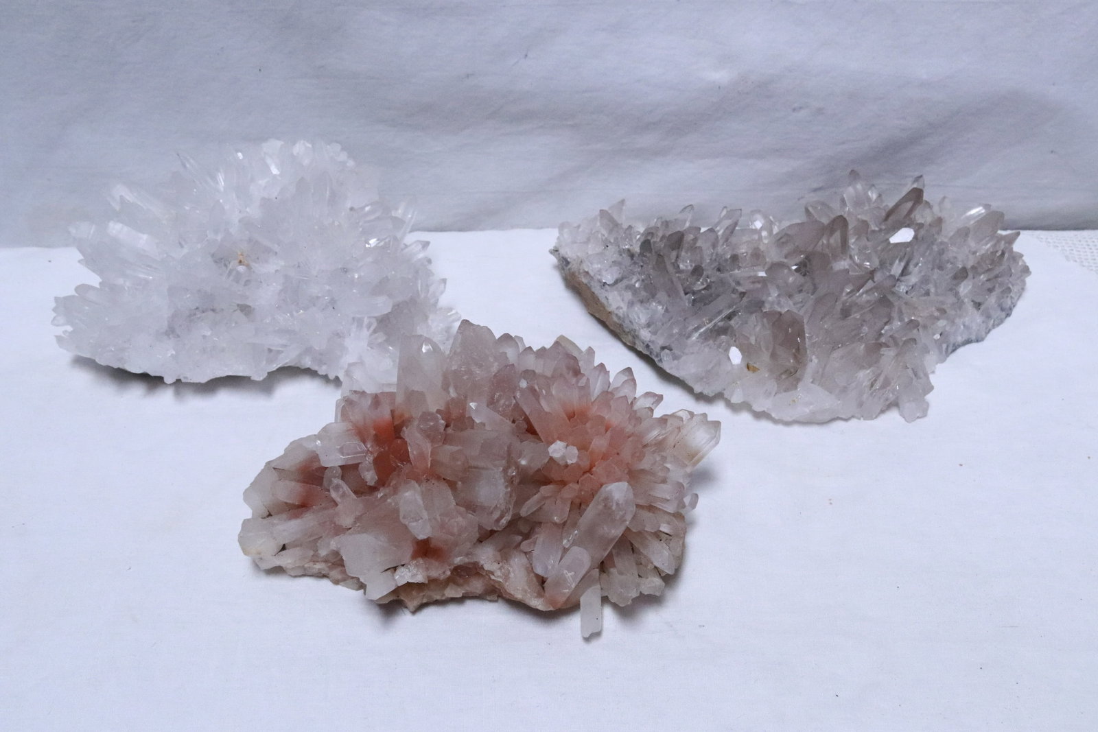 3 large quartz crystal clusters: 3 large quartz crystal clusters, 3.15"x7"x5.2" - 2.35"x8.85"x5.6"