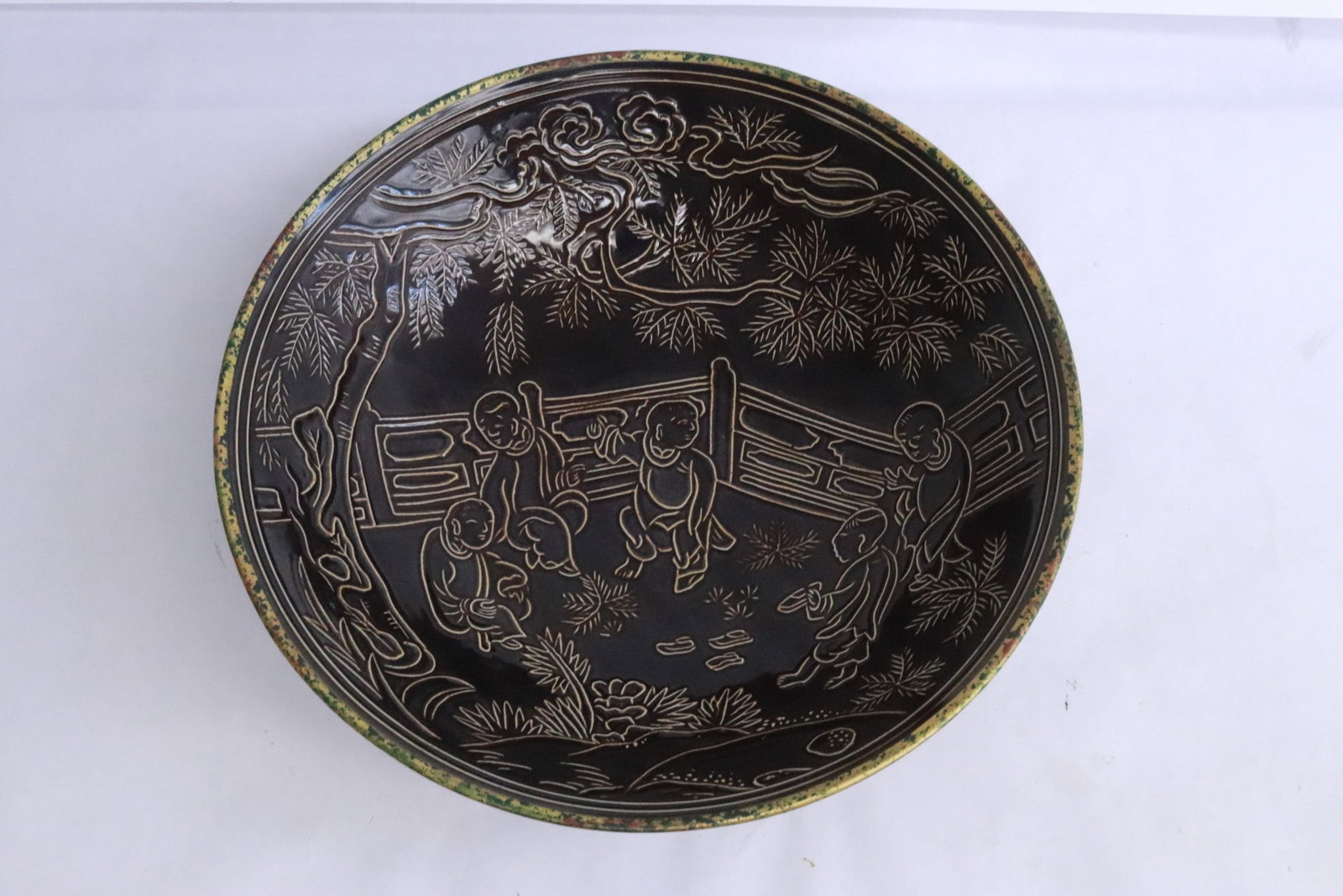 A brown glazed porcelain bowl (1 of 7)