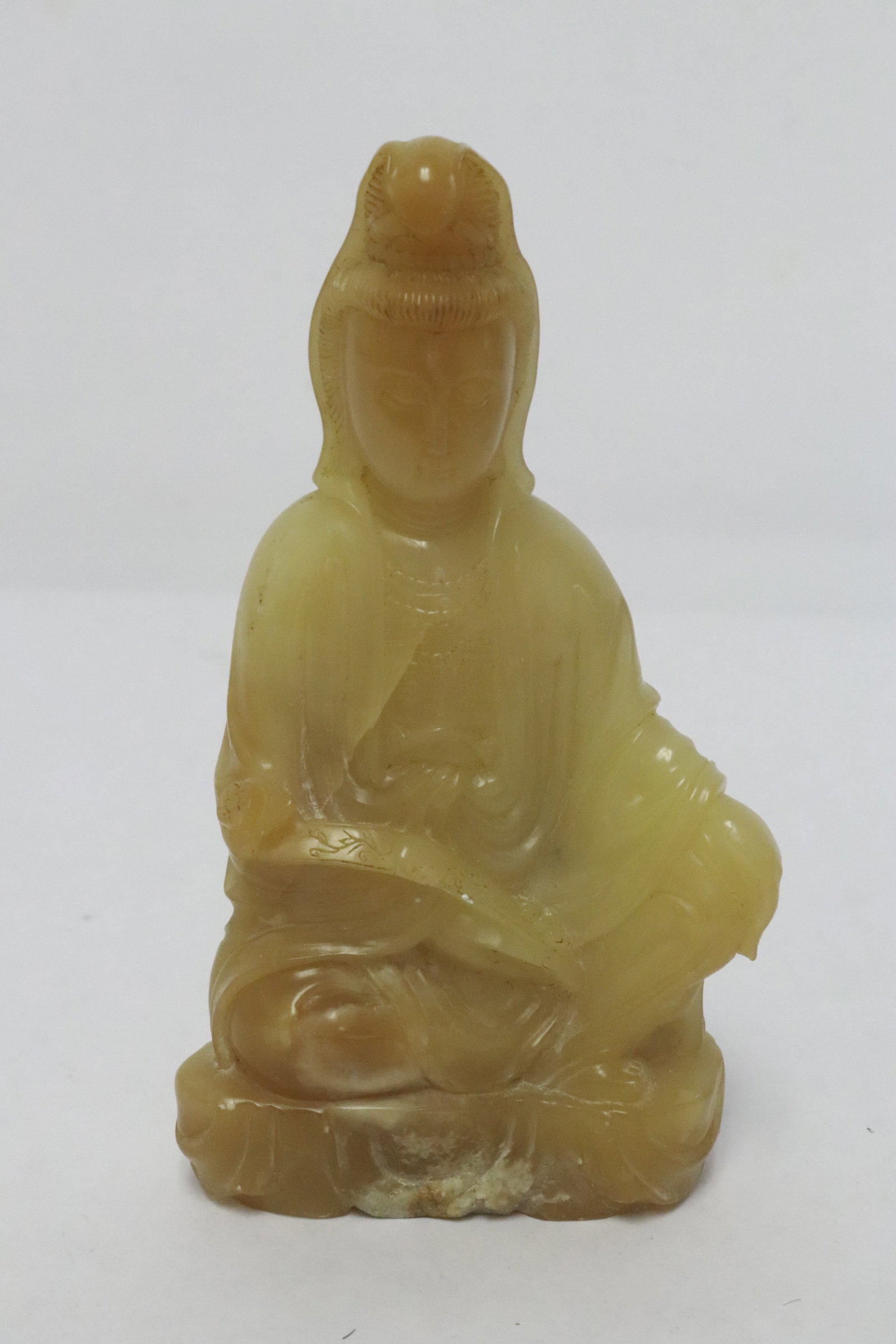 A finely carved shoushan stone deity, signed (1 of 6)