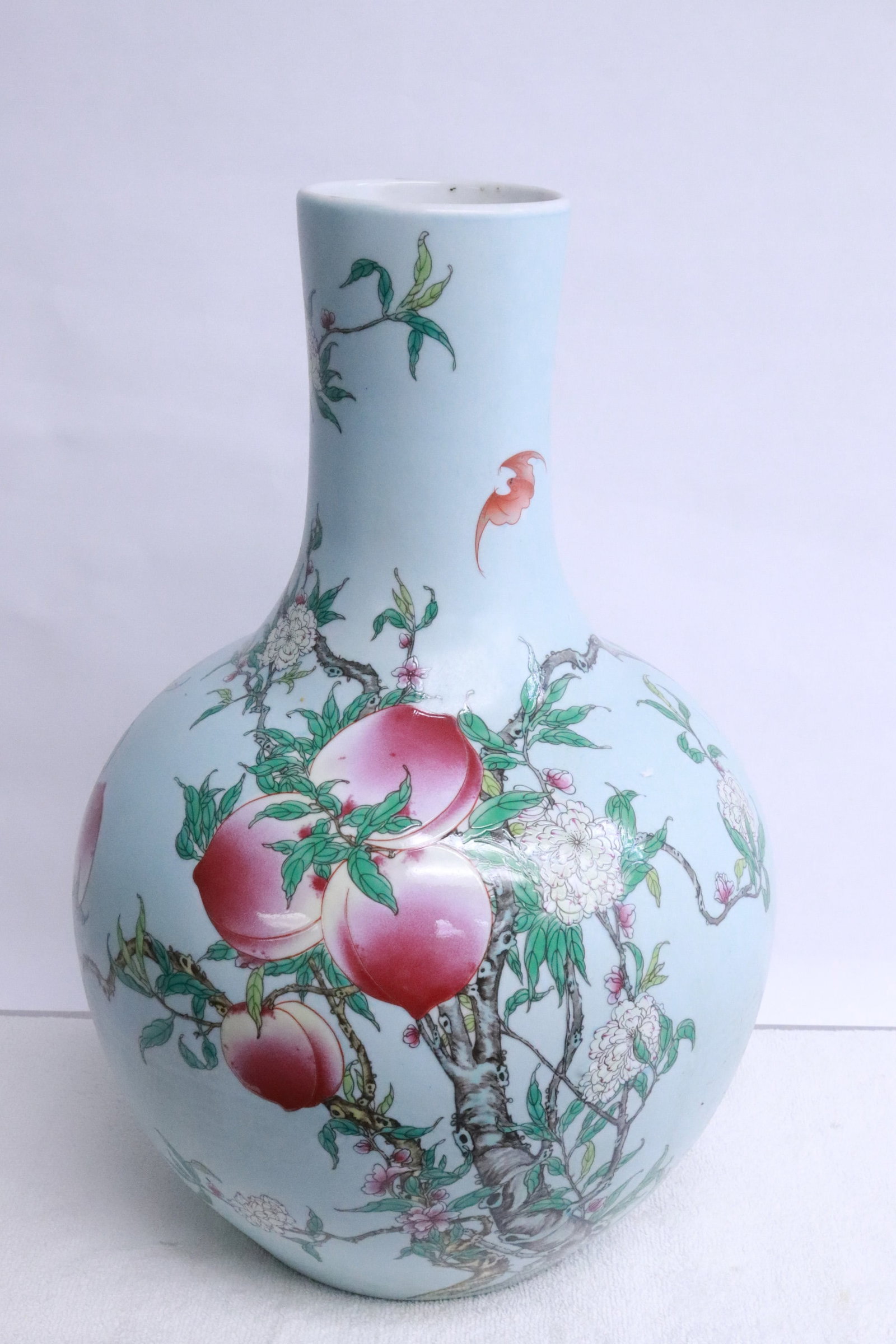 Chinese sky blue background porcelain bottle vase: Chinese sky blue background famille rose porcelain bottle vase, 15.75"x10.6"dia