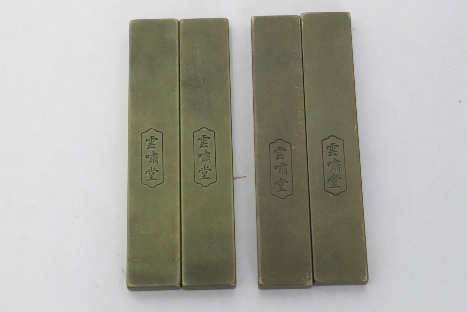 2 pairs bronze scroll weights - 8